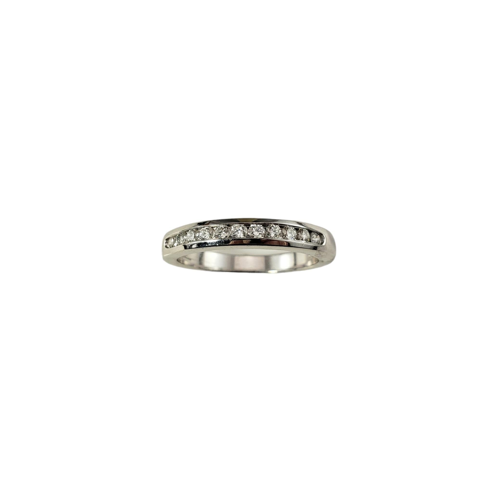 Vintage 14K White Gold Diamond Band Ring Size 6.5-

This sparkling band features 11 round brilliant cut diamonds set in classic 14K white gold.  Width: 3 mm.
Shank: 2.5 mm.

Approximate total diamond weight: .28 ct.

Diamond color: G

Diamond