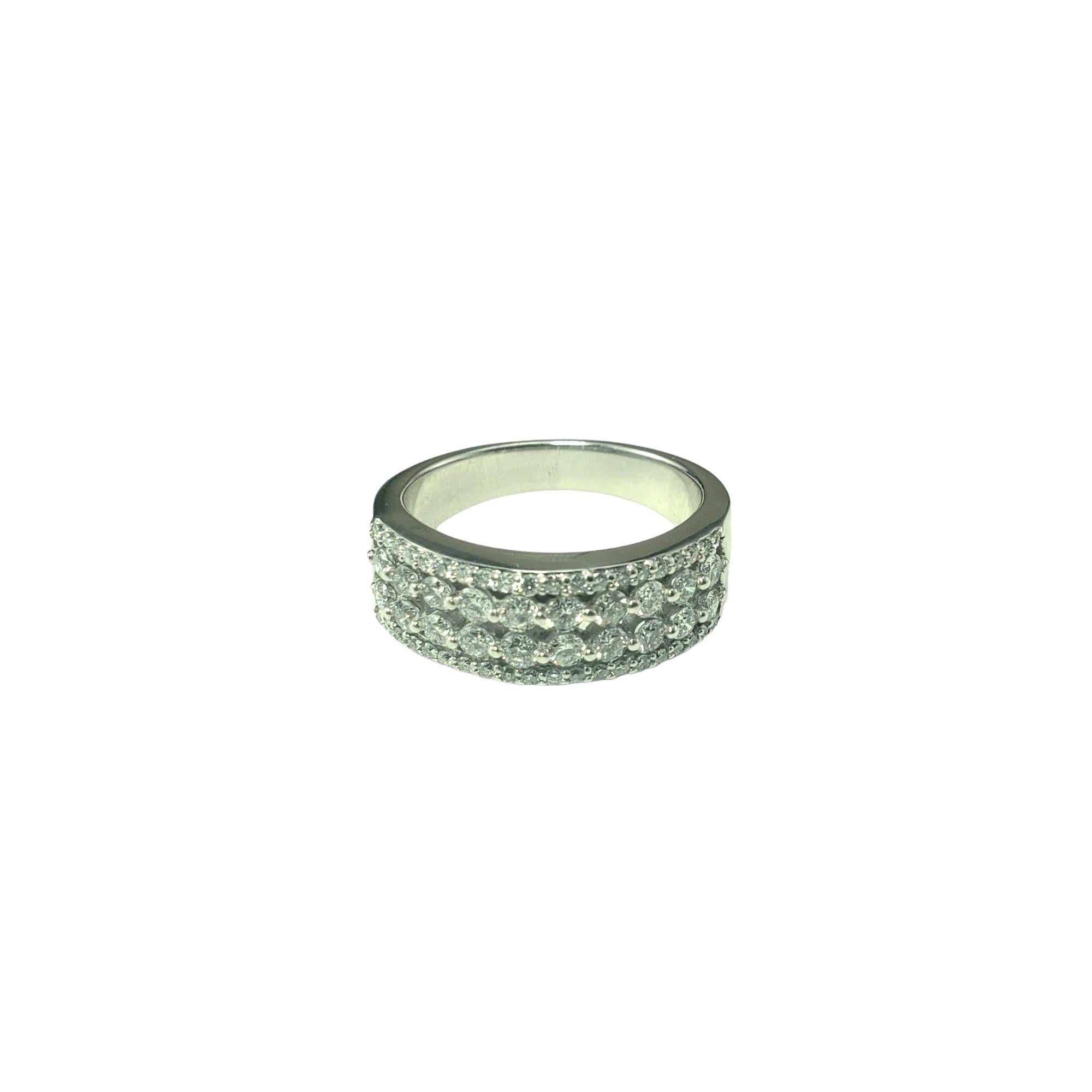 14 Karat White Gold and Diamond Band Ring Size 7-7.25

This sparkling band features 60 round brilliant cut diamonds set in classic 14K white gold.  

Width: 7 mm.
Shank: 4 mm.

Approximate total diamond weight: 1.20 ct.

Diamond color: G-I

Diamond