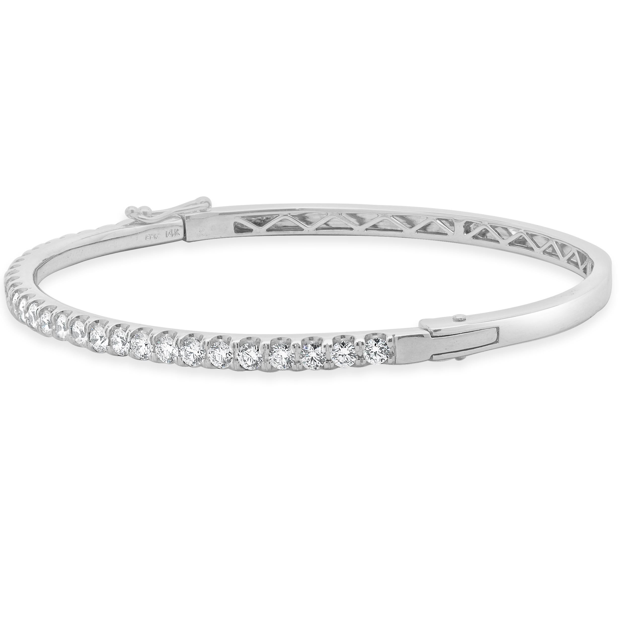 Designer: custom design
Material: 14K white gold
Diamond: 29 round brilliant cut = 1.30cttw
Color: H
Clarity: SI1
Dimensions: bracelet will fit up to a 6.5-inch wrist
Weight: 11.53 grams
