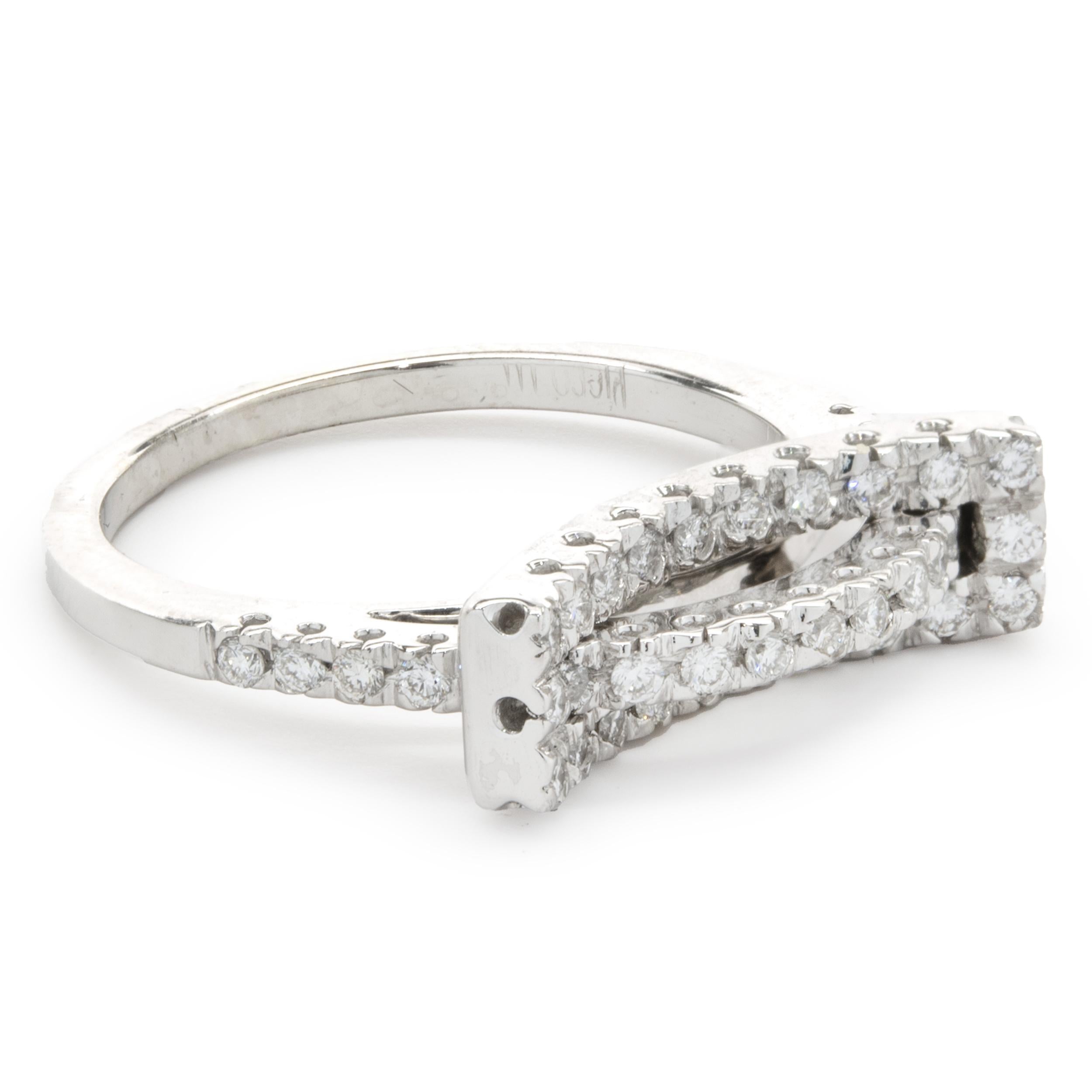 Designer: custom
Material: 14K white gold
Diamond: 39 round brilliant cut = 0.78cttw
Color: G
Clarity: SI1
Ring size: 7.75 (please allow two additional shipping days for sizing requests)
Weight: 5.58 grams