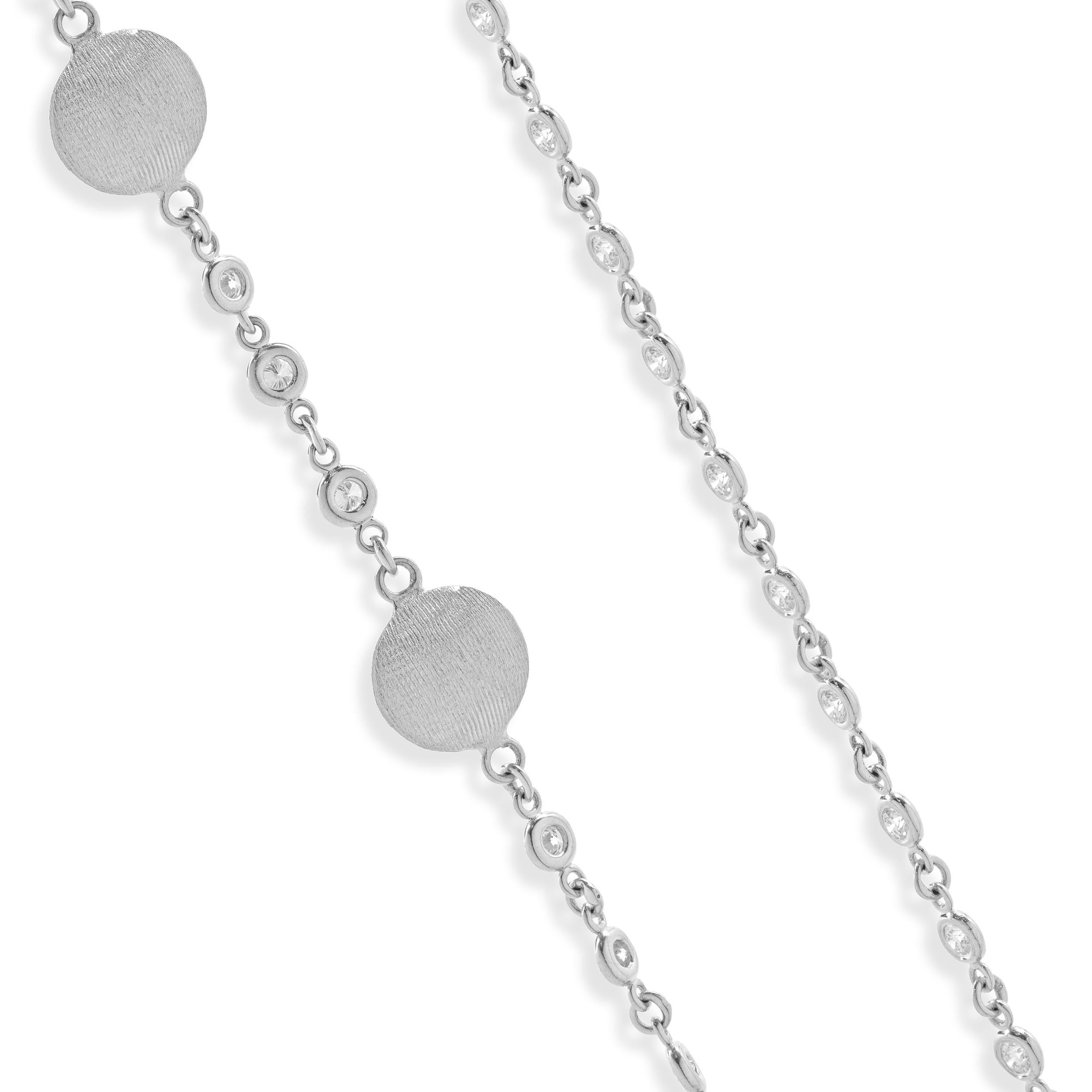 Designer: custom design
Material: 14K white gold
Diamond: 38 round brilliant cut = 1.90cttw
Color: G
Clarity: SI1
Dimensions: necklace measures 17-inches in length
Weight: 10.93 grams

