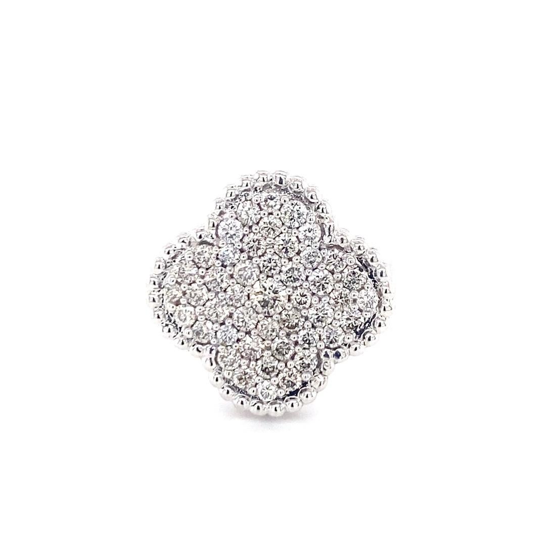 This clover ring is made of 14 karat white gold and has a total diamond weight of 1.18cttw. The ring has a milgrain texture around the clover cluster. This ring makes the perfect gift for any occasion. 