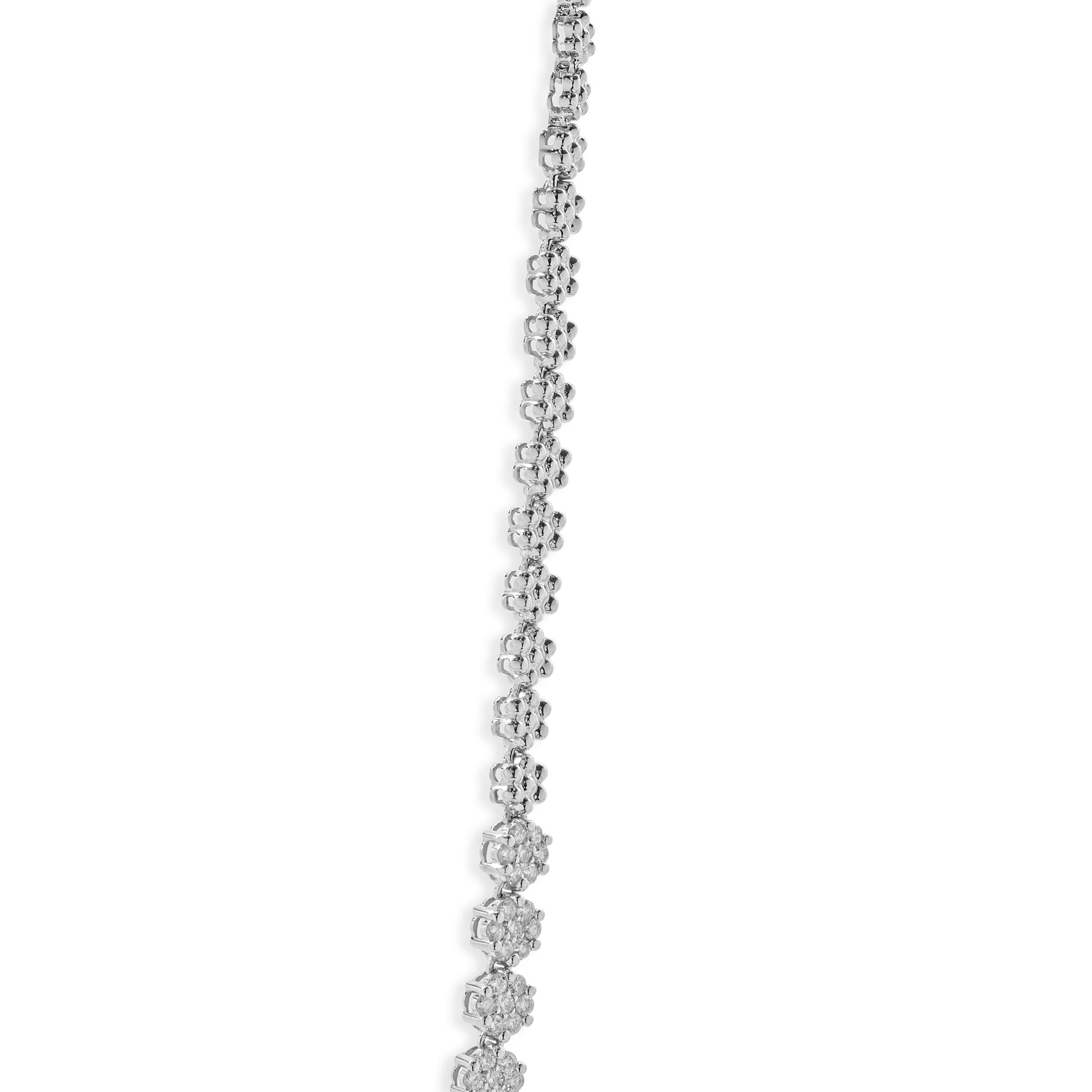 Designer: custom design
Material: 14K white gold
Diamond: round brilliant cut = 4.13cttw
Color: I / J
Clarity: SI1
Dimensions: necklace measures 18-inches in length
Weight: 20.03 grams

