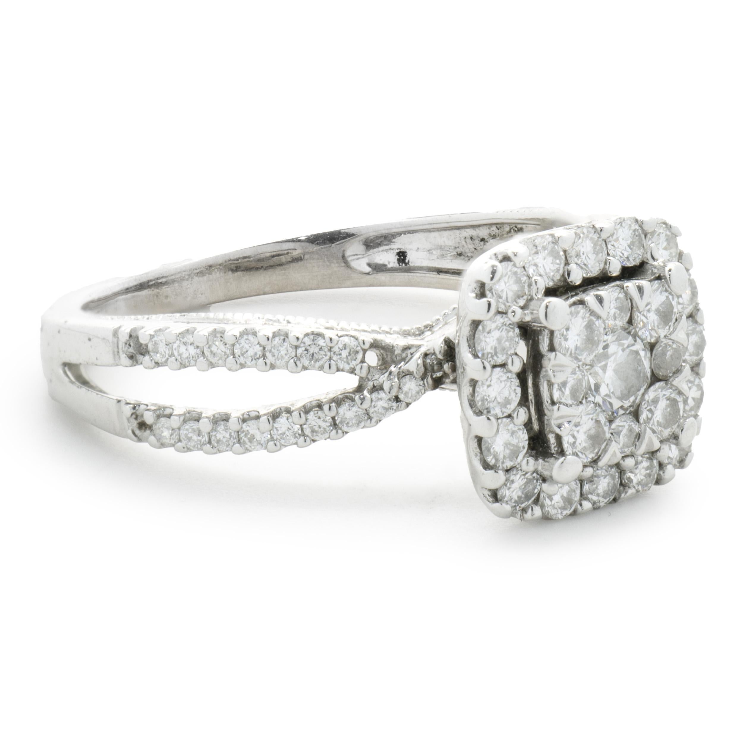 Designer: Custom
Material: 14K white gold
Diamond: 63 round brilliant cut = 1.02cttw
Color: H
Clarity: SI1
Dimensions: ring top measures 9mm wide
Ring Size: 5.25 (complimentary sizing available)
Weight: 2.84 grams