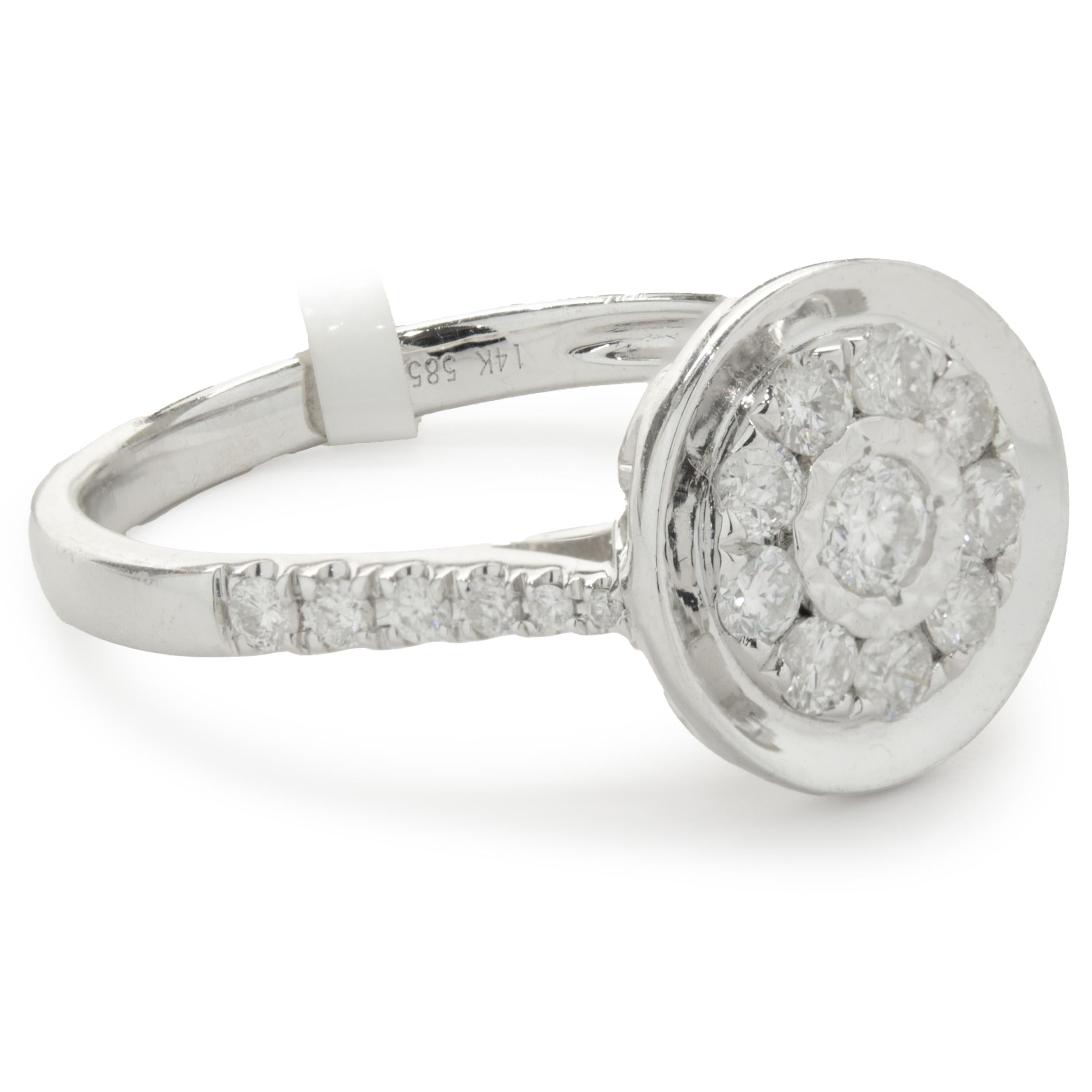 Designer: custom
Material: 14K white gold
Diamond: 17 round brilliant= 0.53cttw
Color: G
Clarity: VS
Ring size: 6.75 (please allow two additional shipping days for sizing requests)
Weight: 3.20 grams