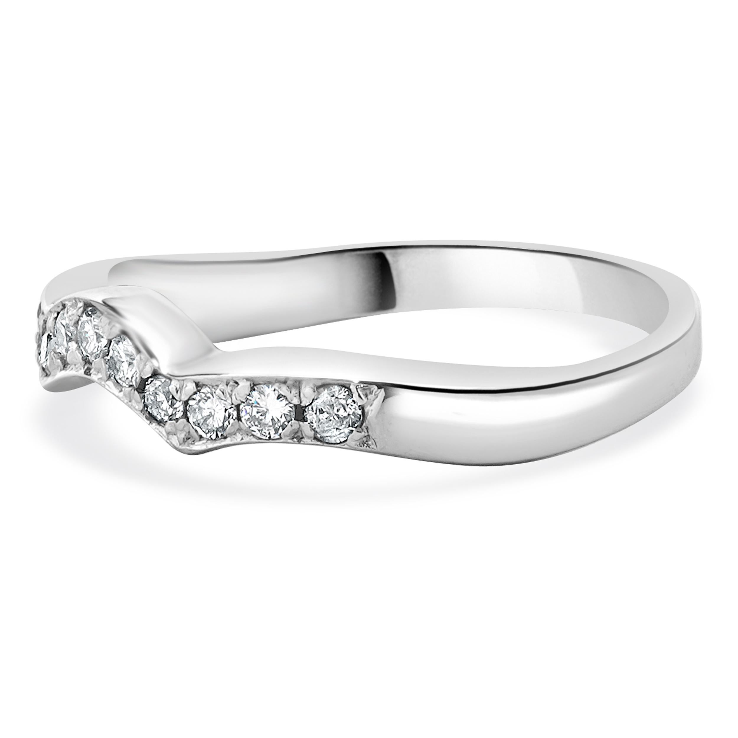 Designer: custom
Material: 14K white gold
Diamond: round brilliant cut = 0.20cttw
Color: H / I
Clarity: SI2
Ring size: 6.25 (please allow two additional shipping days for sizing requests)
Weight: 2.72 grams
