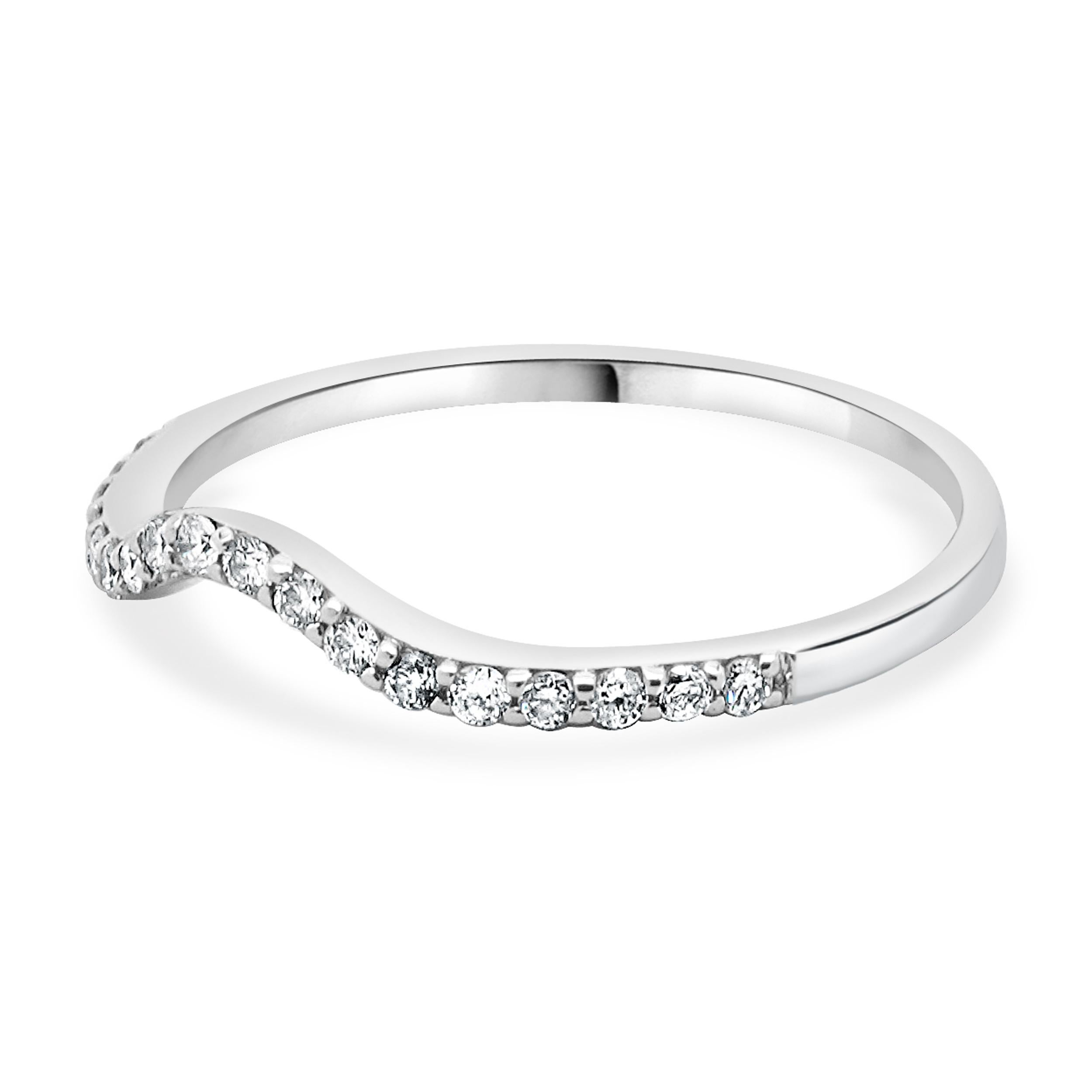 Designer: custom
Material: 14K white gold
Diamond: 18 round brilliant cut = 0.18cttw
Color: I
Clarity: SI2
Ring size: 7 (please allow two additional shipping days for sizing requests)
Weight: 1.20 grams
