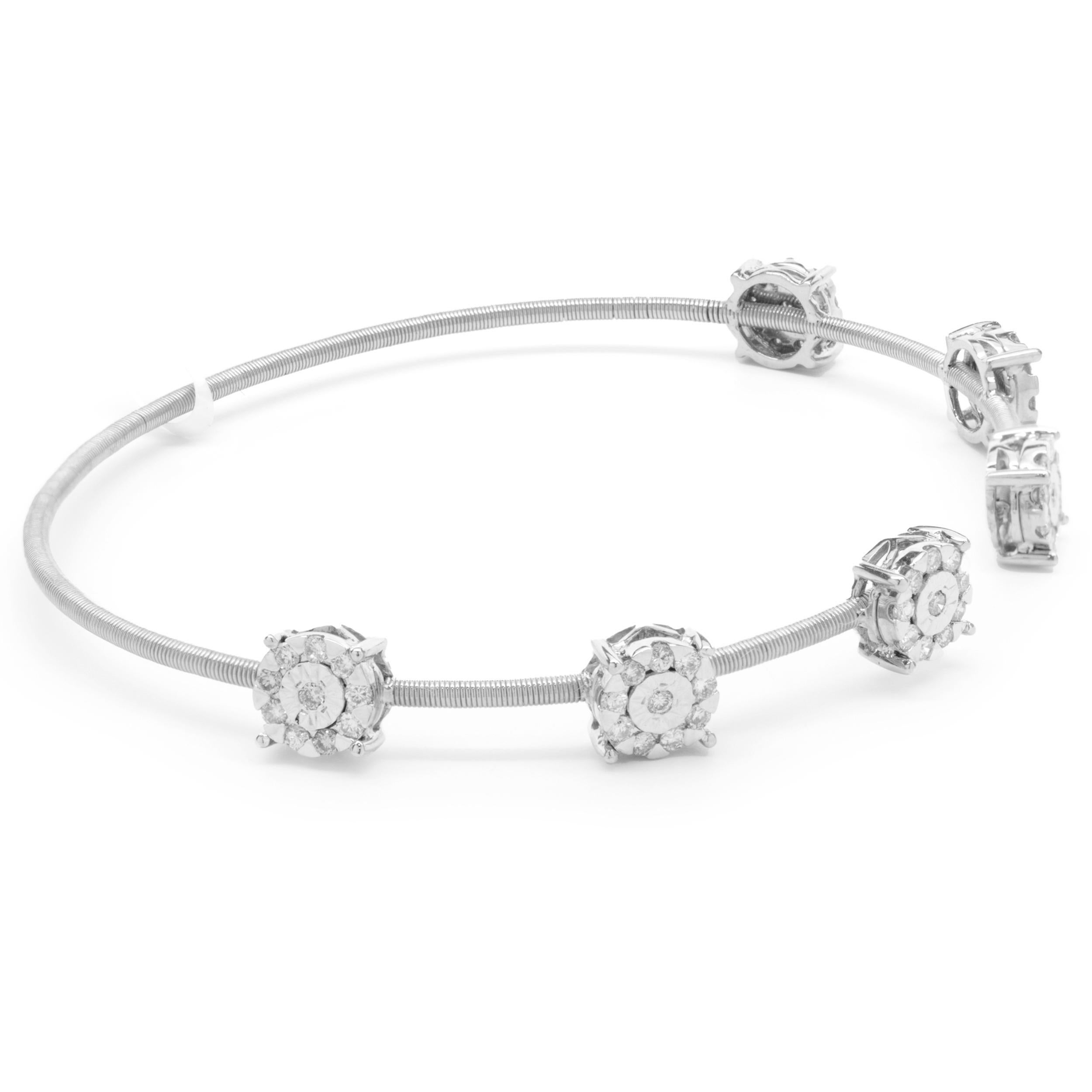 Designer: custom 
Material: 14K white gold
Diamond: 60 round diamonds= 0.70cttw
Color:  G
Clarity: VS
Dimensions: bracelet will fit up to a 7.5-inch wrist
Weight: 6.86 grams
