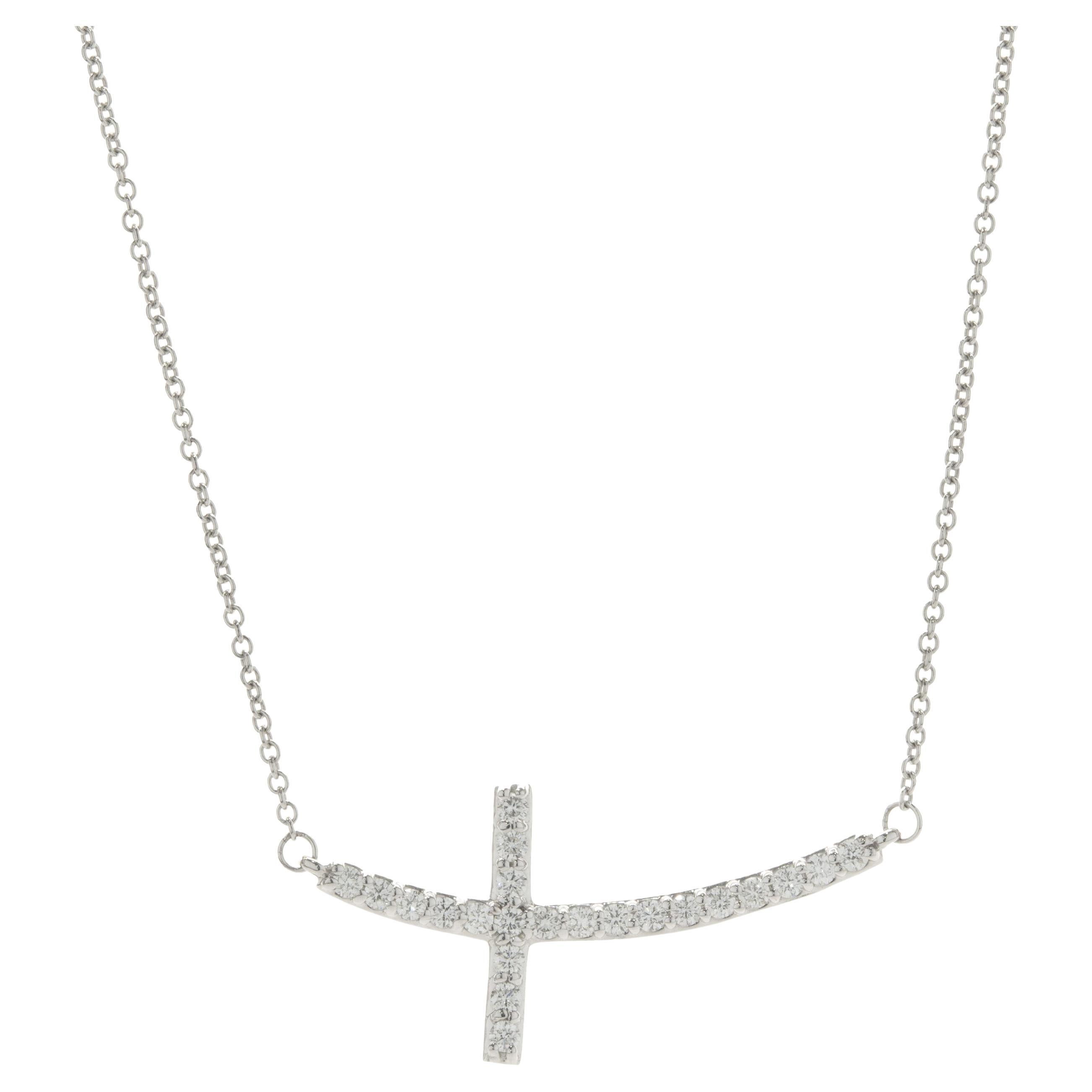 14 Karat White Gold Diamond Curve Cross Necklace For Sale