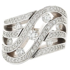 Bague vague en or blanc 14 carats avec diamants découpés