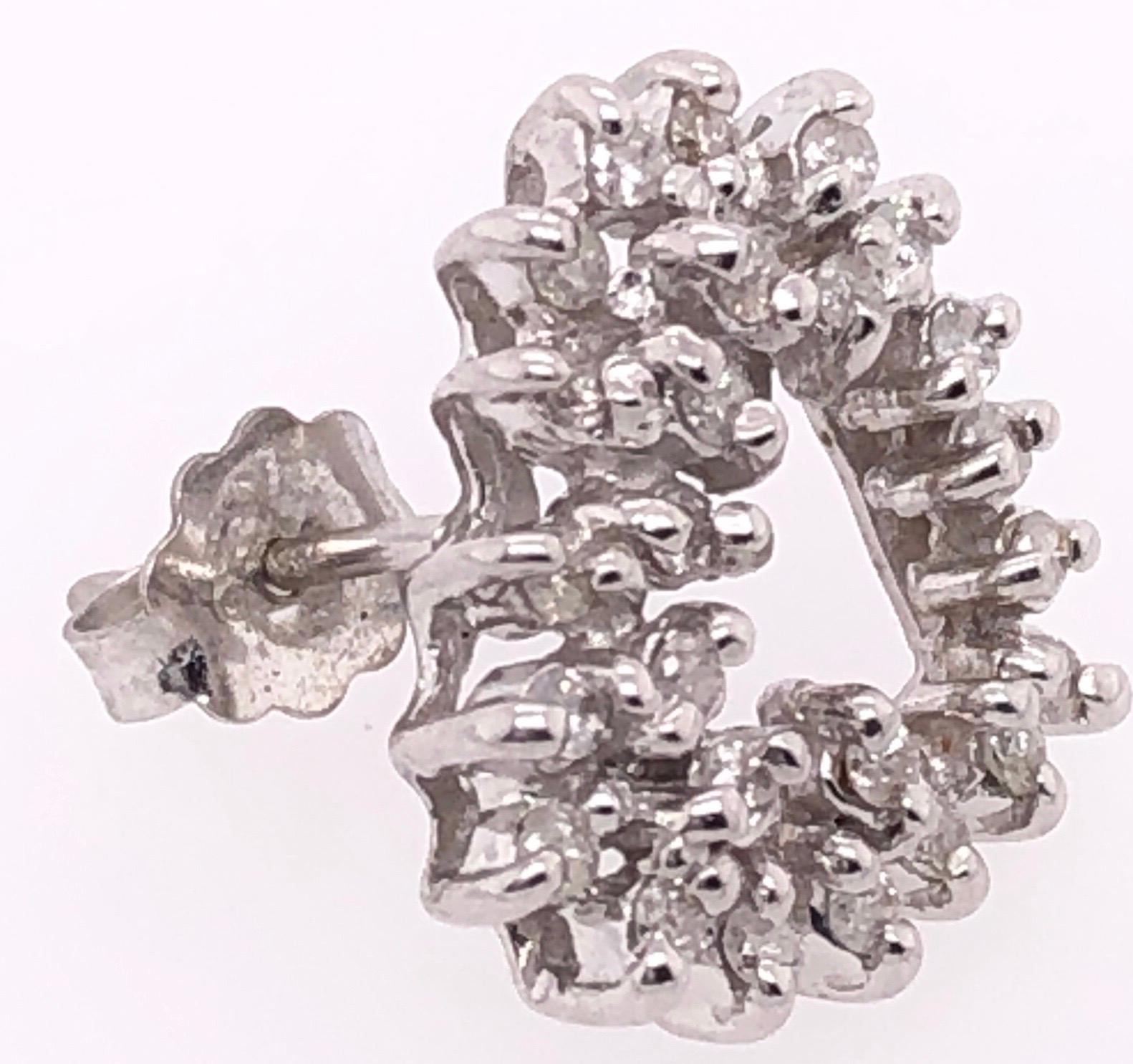 14 Karat White Gold Diamond Encrusted Heart Button / Stud Earrings
3.76 grams total weight.
