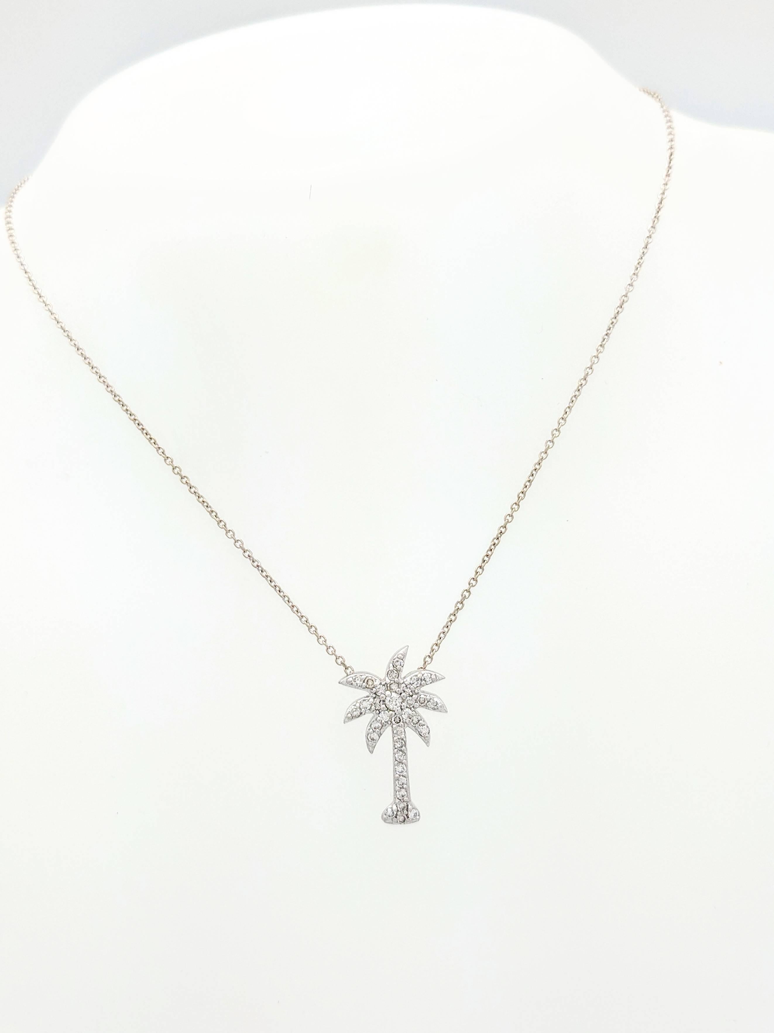 14K White Gold Diamond Encrusted Palm Tree Pendant Necklace

You are viewing a beautiful diamond encrusted palm tree pendant necklace. This piece is crafted from 14k white gold and weighs 3.8 grams. The pendant features (33) round natural brilliant