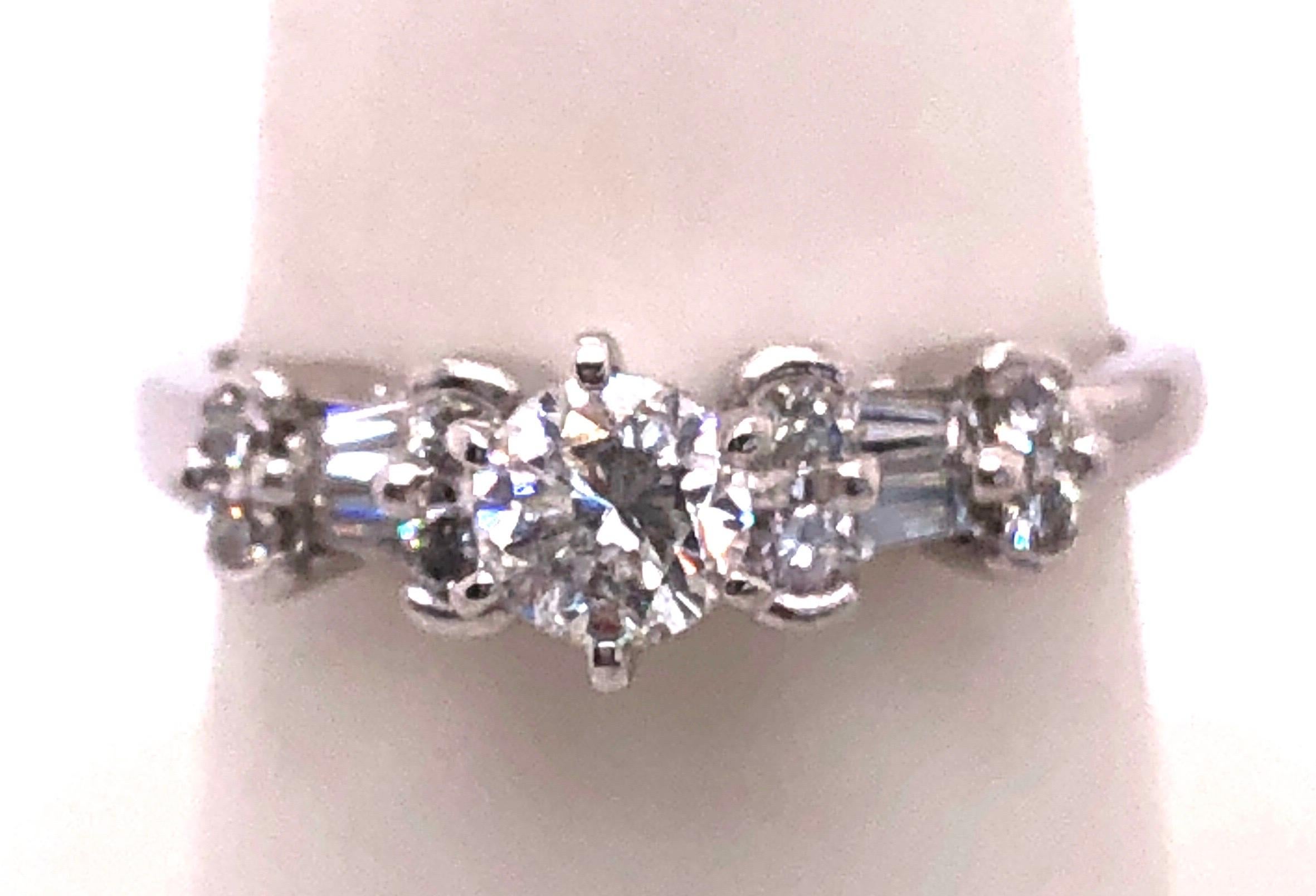 14 Karat White Gold Diamond Engagement Ring 1.30 Total Diamond Weight.
Size 7.25
3.2 grams total weight