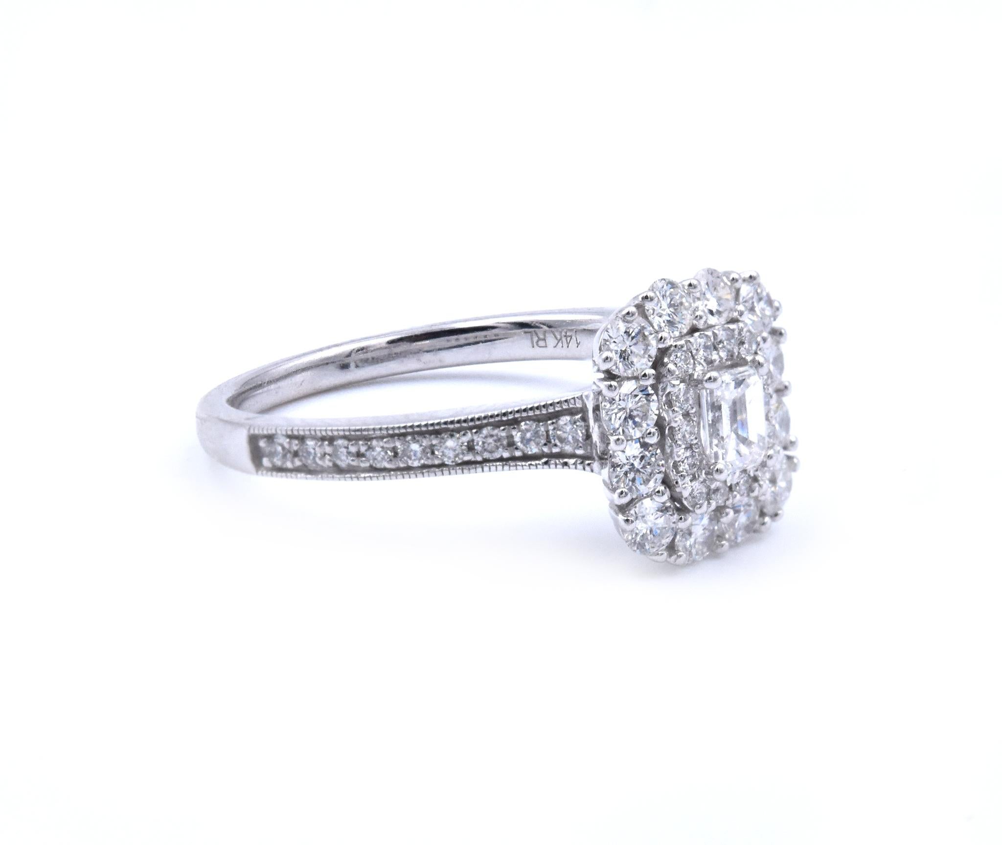 Material: 14k white gold
Center Diamond: 1 emerald cut = .15ct
Color: G
Clarity: VS1
Diamonds: 48 round brilliant cut = .57cttw
Color: G
Clarity: VS1
Ring Size: 7 (please allow up to 2 additional business days for sizing requests)
Dimensions: ring