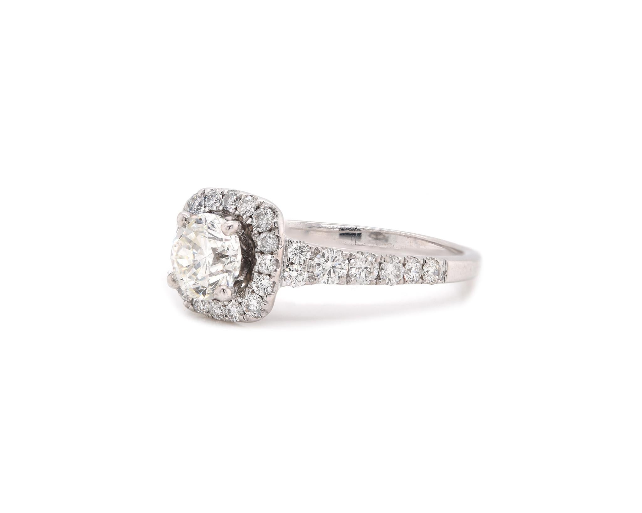 Material: 14K white gold
Center Diamond: 1 round brilliant cut = .80ct
Color: K
Clarity: VS2
Diamonds: 30 round cut = .50cttw
Color: G
Clarity: VS
Ring Size: 8 (please allow up to 2 additional business days for sizing requests)
Dimensions: ring