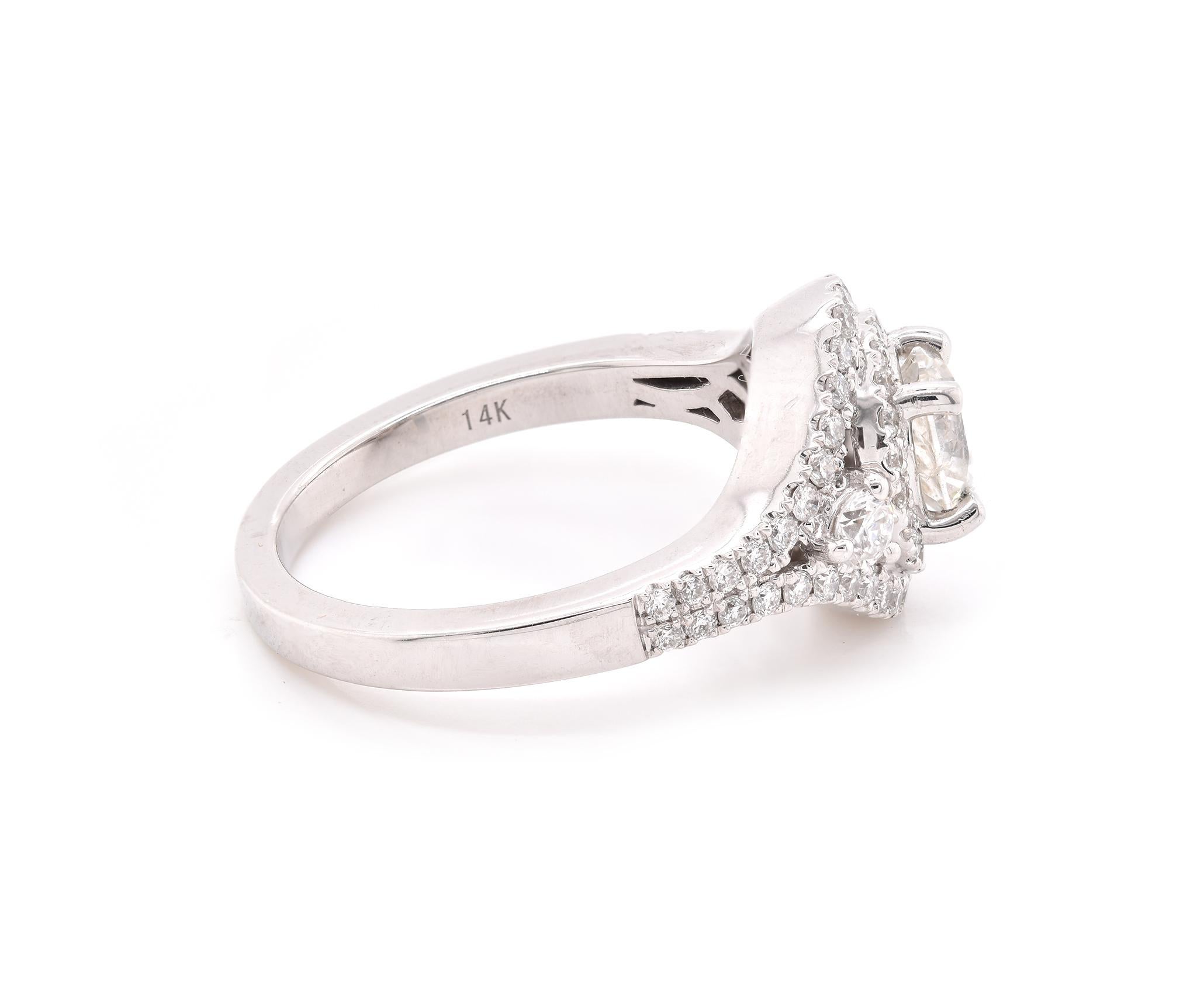Designer: custom
Material: 14K white gold
Center Diamond: 1 round brilliant cut = 0.85ct
Color: I
Clarity: SI2
Diamond: 88 round brilliant cut = 1.04cttw
Color: G
Clarity: SI1
Ring Size: 6.5 (please allow up to 2 additional business days for sizing
