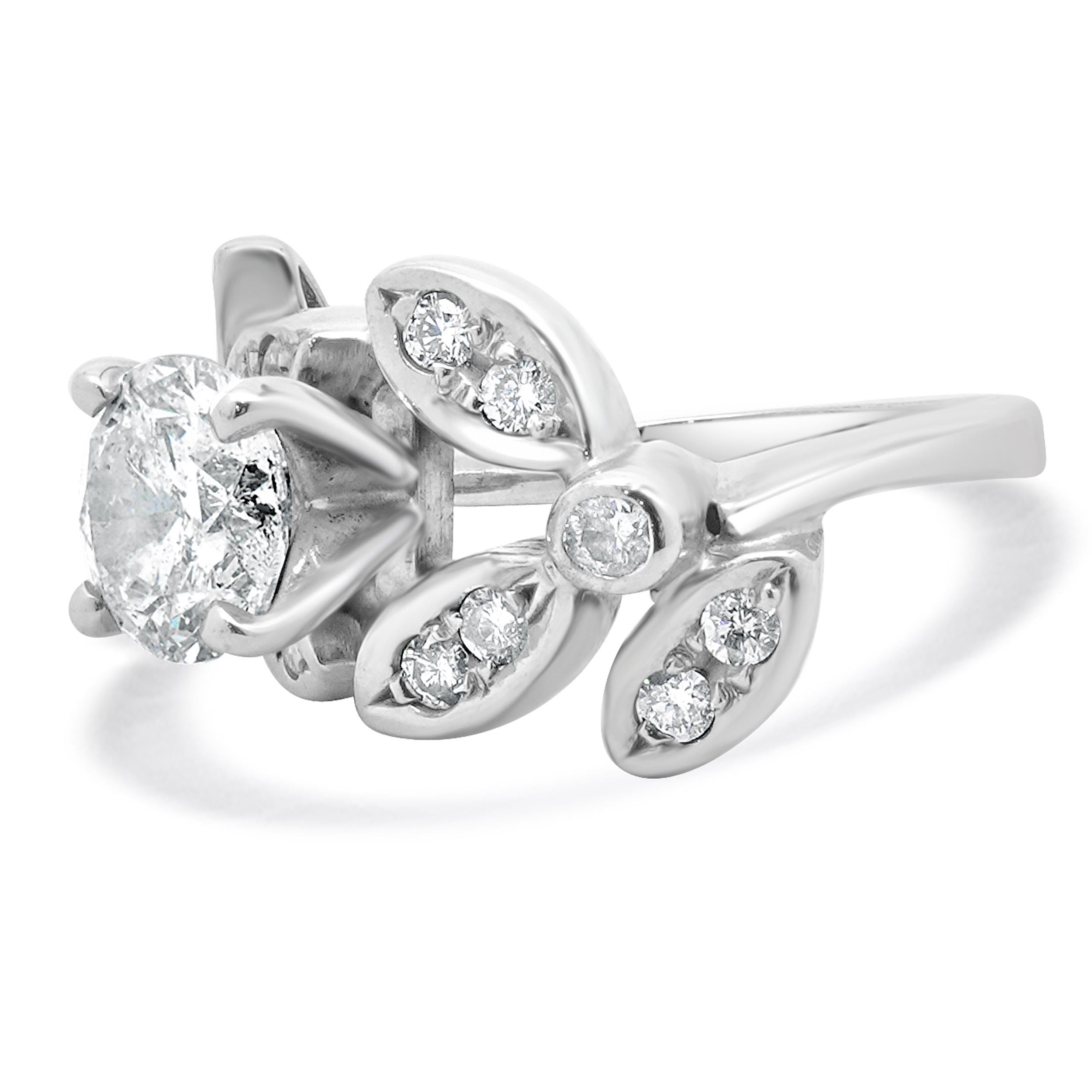 Designer: custom
Material: 14K white gold
Diamond: round brilliant cut = 1.55cttw
Color: L
Clarity: I2
IGL: 13518119
Diamond: 14 round cut = 0.45cttw
Color: I
Clarity: I1
Ring Size: 5.25 (please allow two additional shipping days for sizing
