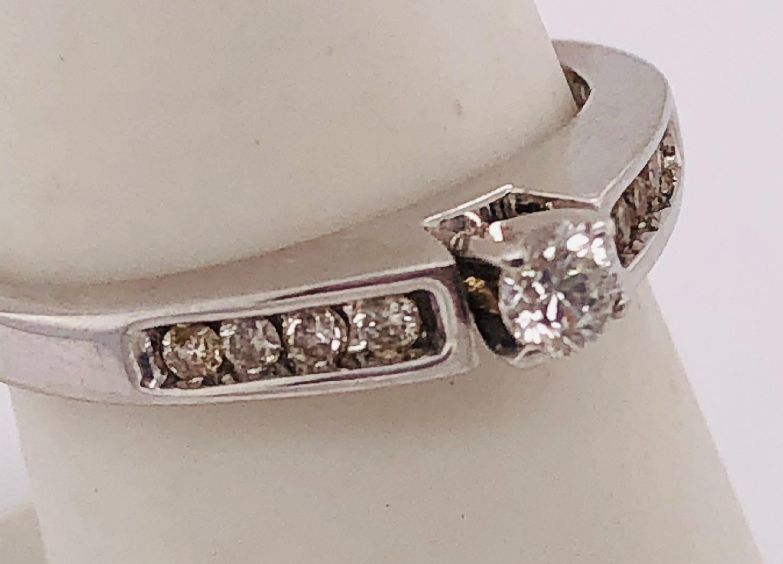 14Kt White Gold Engagement Ring with Diamond 0.31 Total Diamond Weight
Size 6.75 with 3.31 grams total weight
