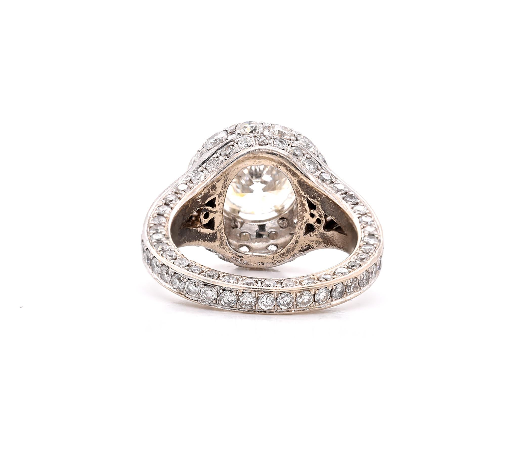 Round Cut 14 Karat White Gold Diamond Engagement Ring with Pave Diamond Setting