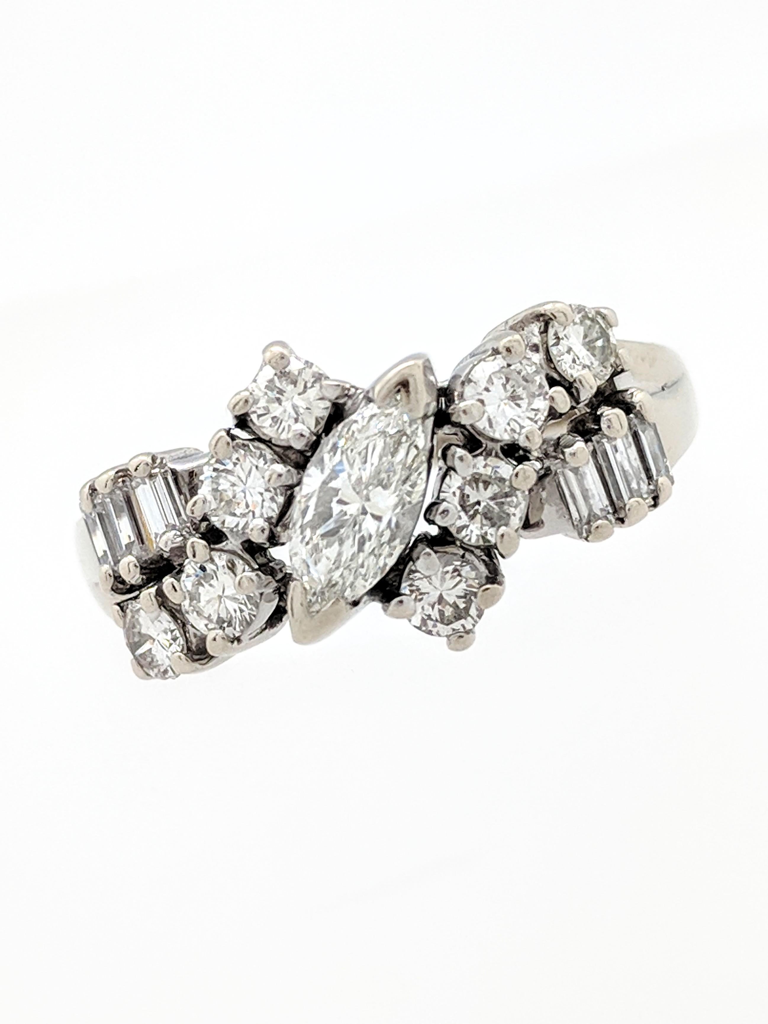 14k White Gold Diamond Estate Ring

You are viewing a beautiful diamond estate ring. This ring is crafted from 14k white gold and weighs 4.2 grams. It features one (1) .25ct natural marquise cut diamond, (8) .07ct natural round brilliant cut