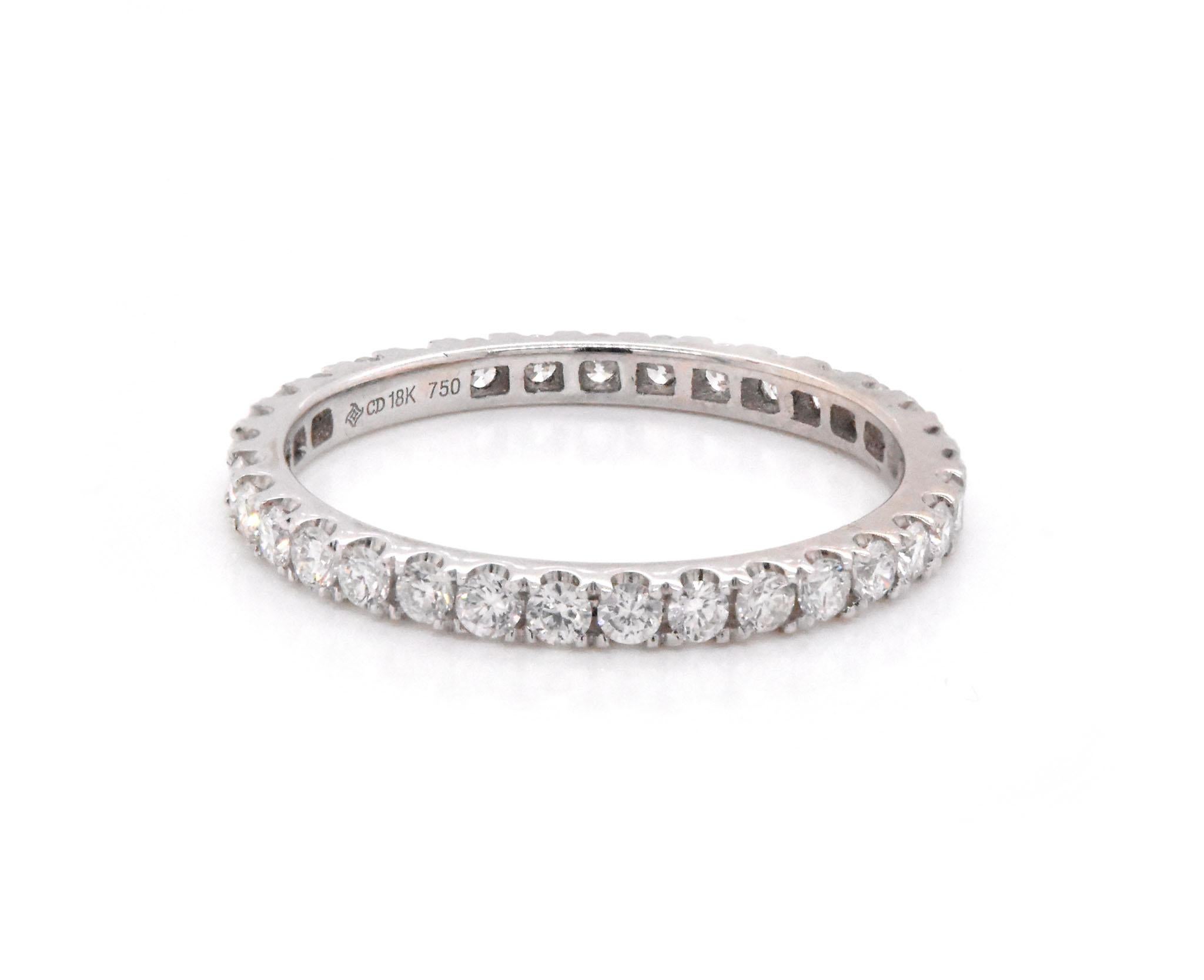 Designer: custom
Material: 14k white gold
Diamonds: 33 round cut = .85cttw
Color: G
Clarity: VS
Size: 6.25 (please allow two additional shipping days for sizing requests)  
Dimensions: ring measures 2mm in width
Weight: 1.46 grams
