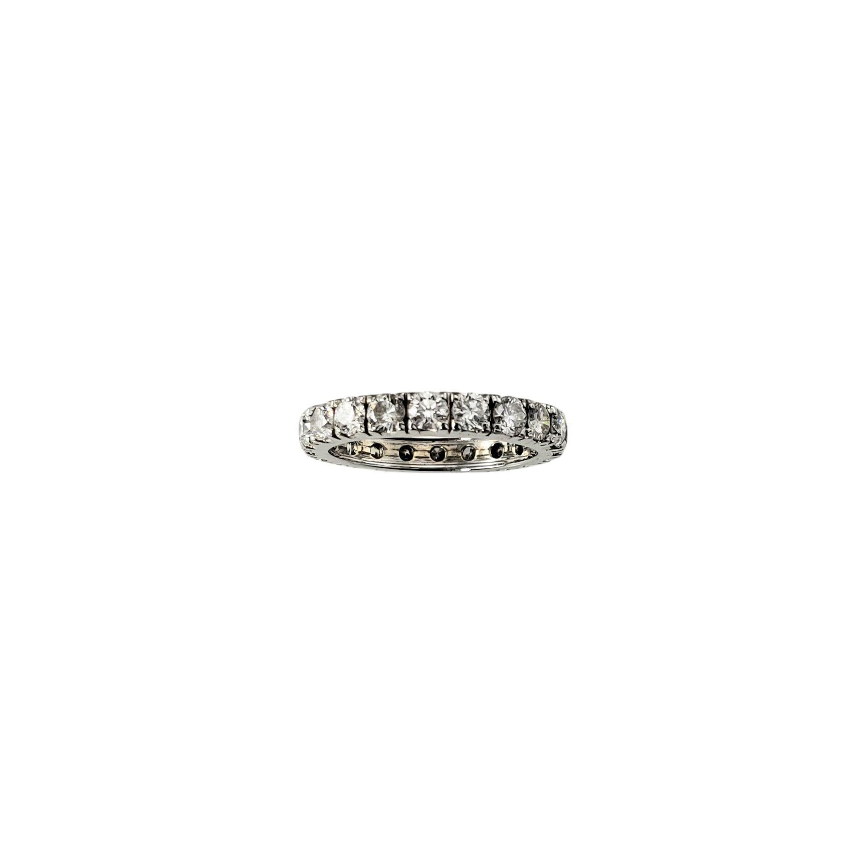 14 Karat White Gold Diamond Eternity Band Ring Size 4.5

This 14K white gold eternity band features 20 natural round brilliant cut diamonds, offering a continuous circle of sparkle. The full circle of diamonds represents lasting love, making it an
