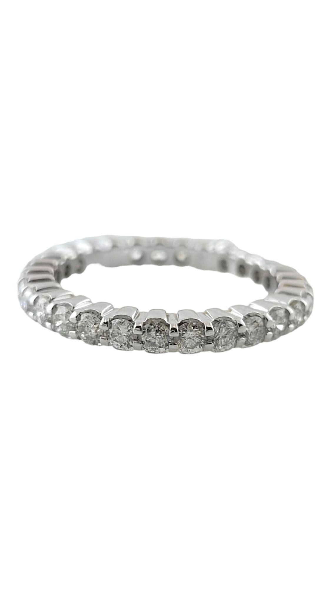 Vintage 14 Karat White Gold Diamond Eternity Band Ring Size 5.5 

This sparkling eternity band features 29 round brilliant cut diamonds set in classic 14K white gold. 

 Width:  3 mm.

Approximate total diamond weight:  1.16 ct.

Diamond color:
