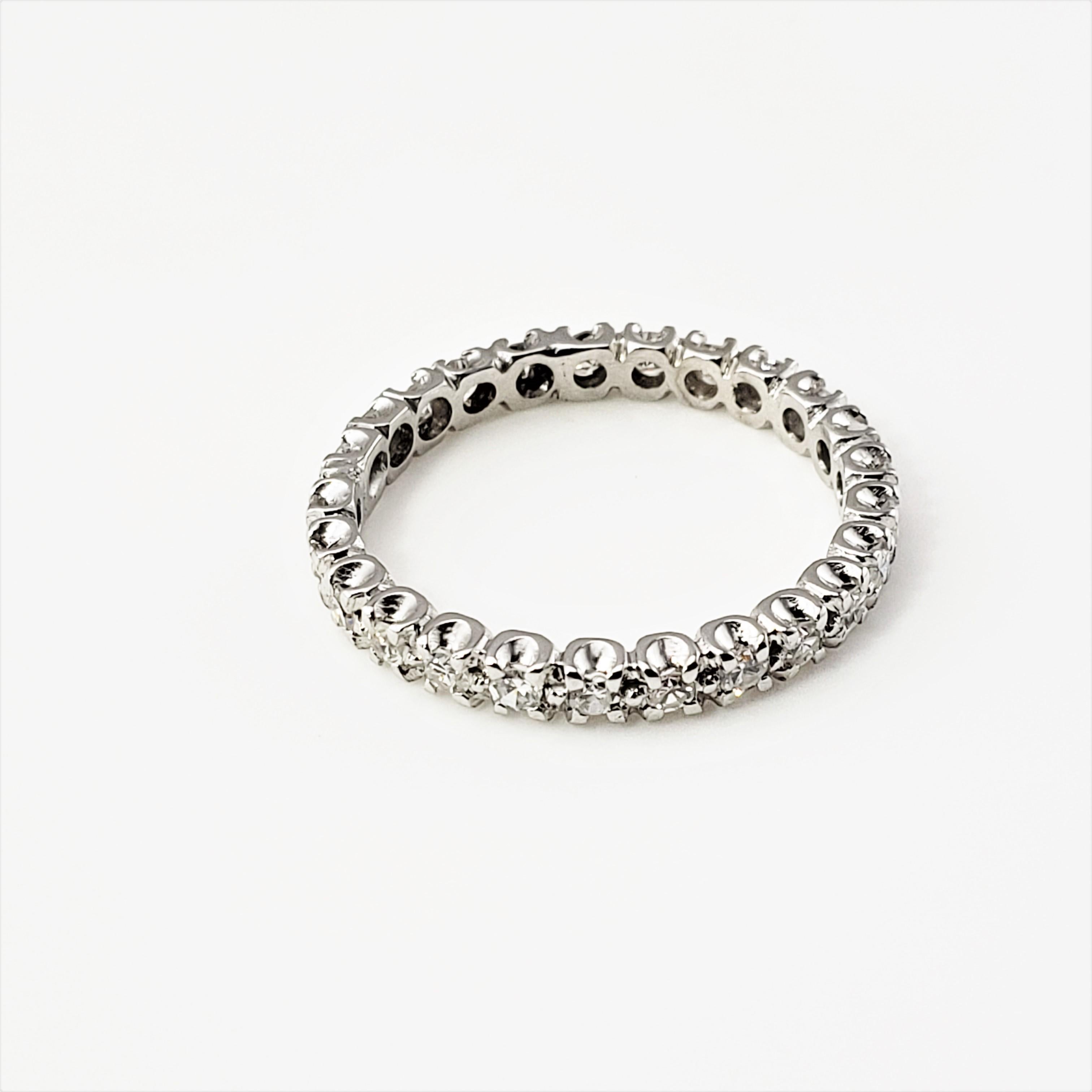 14 Karat White Gold Diamond Eternity Band Size 6.25-

This sparkling eternity band features 25 round single cut diamonds set in classic 14K white gold.  Width:  2.5 mm.

Approximate total diamond weight:  .75 ct.

Diamond color:  G

Diamond clarity: