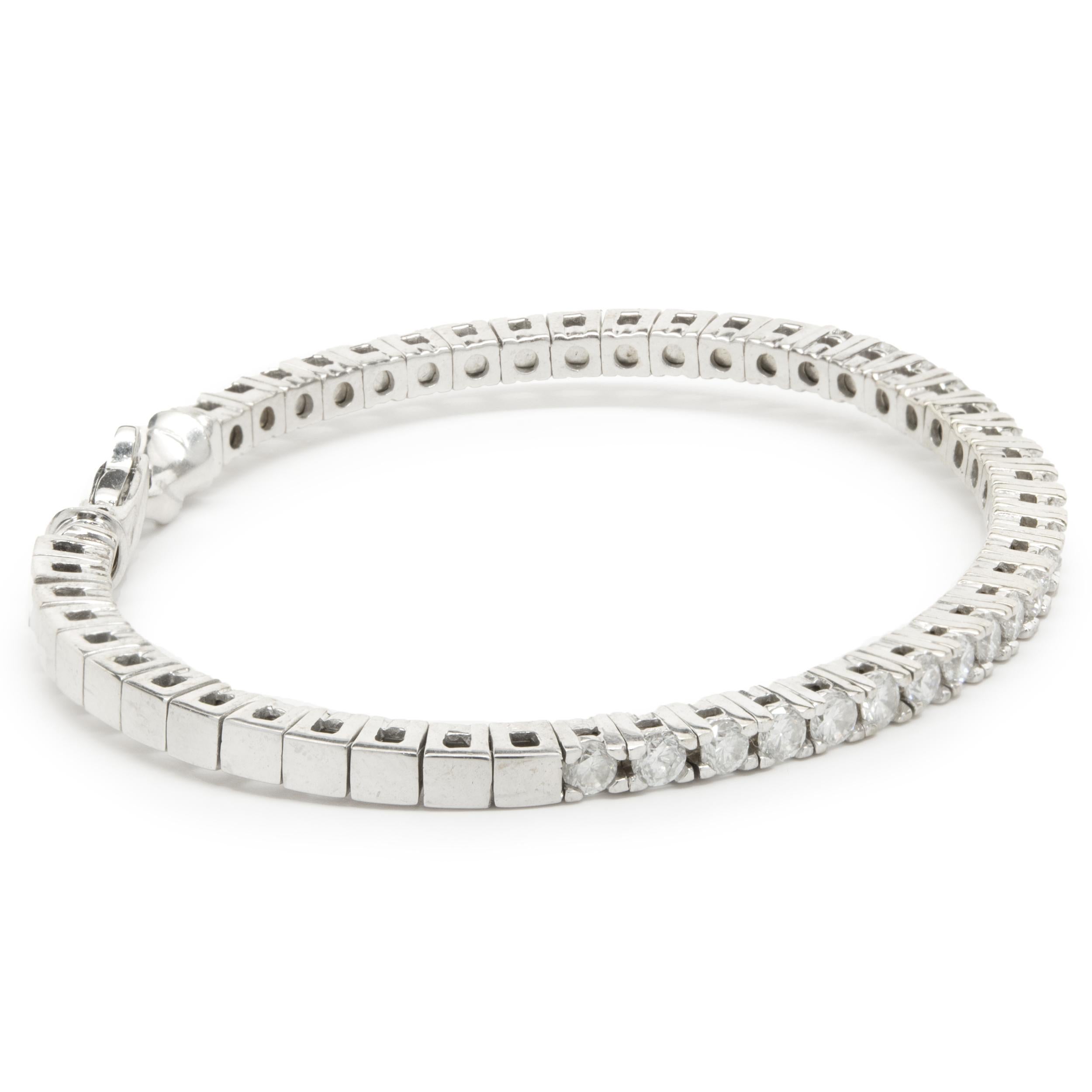 Designer: custom design
Material: 14K white gold
Diamonds: 22 round brilliant cut = 1.54cttw
Color: G / H 
Clarity: SI1
Dimensions: bracelet will fit up to a 7.5-inch wrist
Weight: 17.26 grams