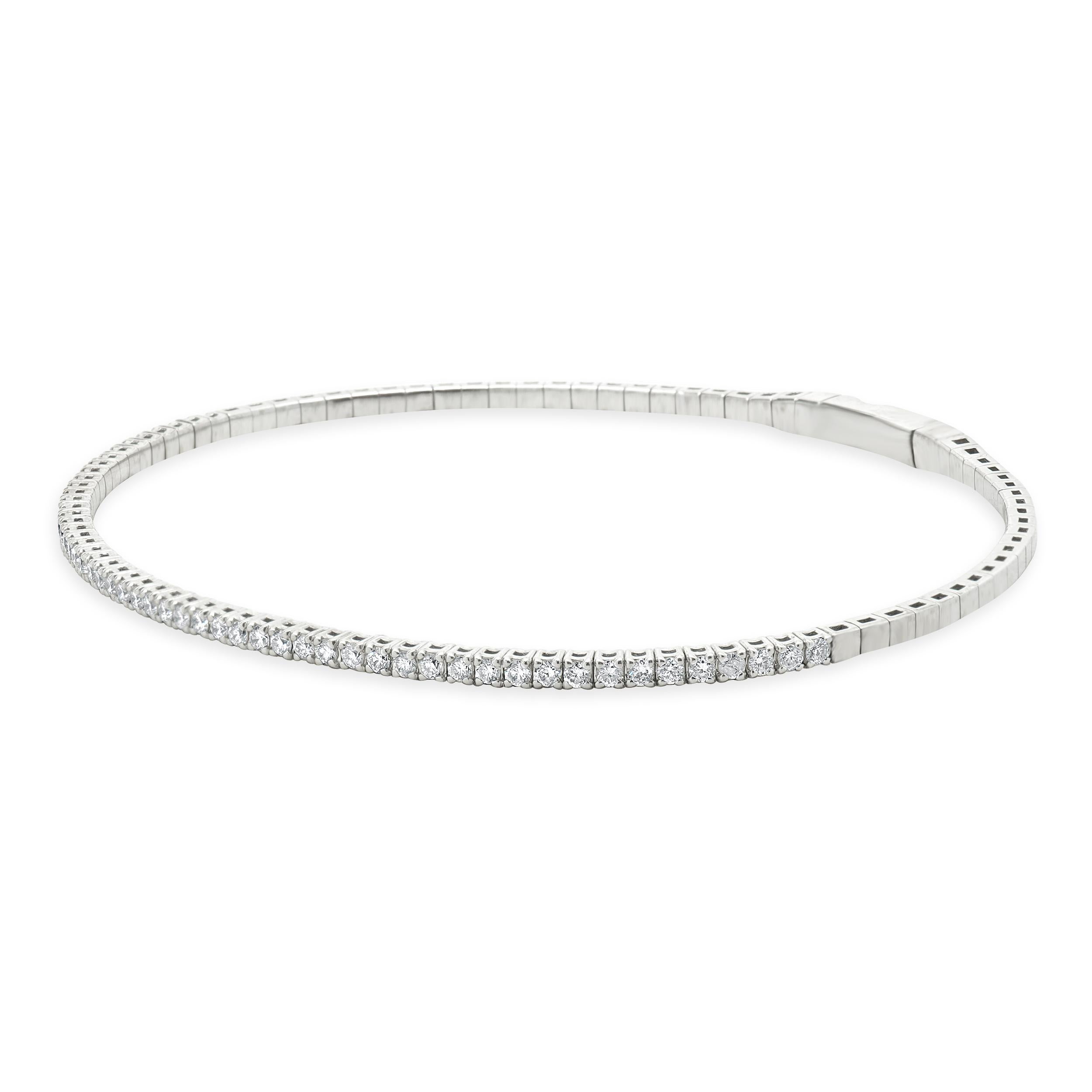 Designer: personalizzato
Materiale: oro bianco 14 carati
Diamante: taglio brillante rotondo = 0,79cttw
Colore: G
Chiarezza: VS1-2
Dimensioni: il braccialetto si adatta a un polso di 7 pollici
Peso: 5.91 grammi