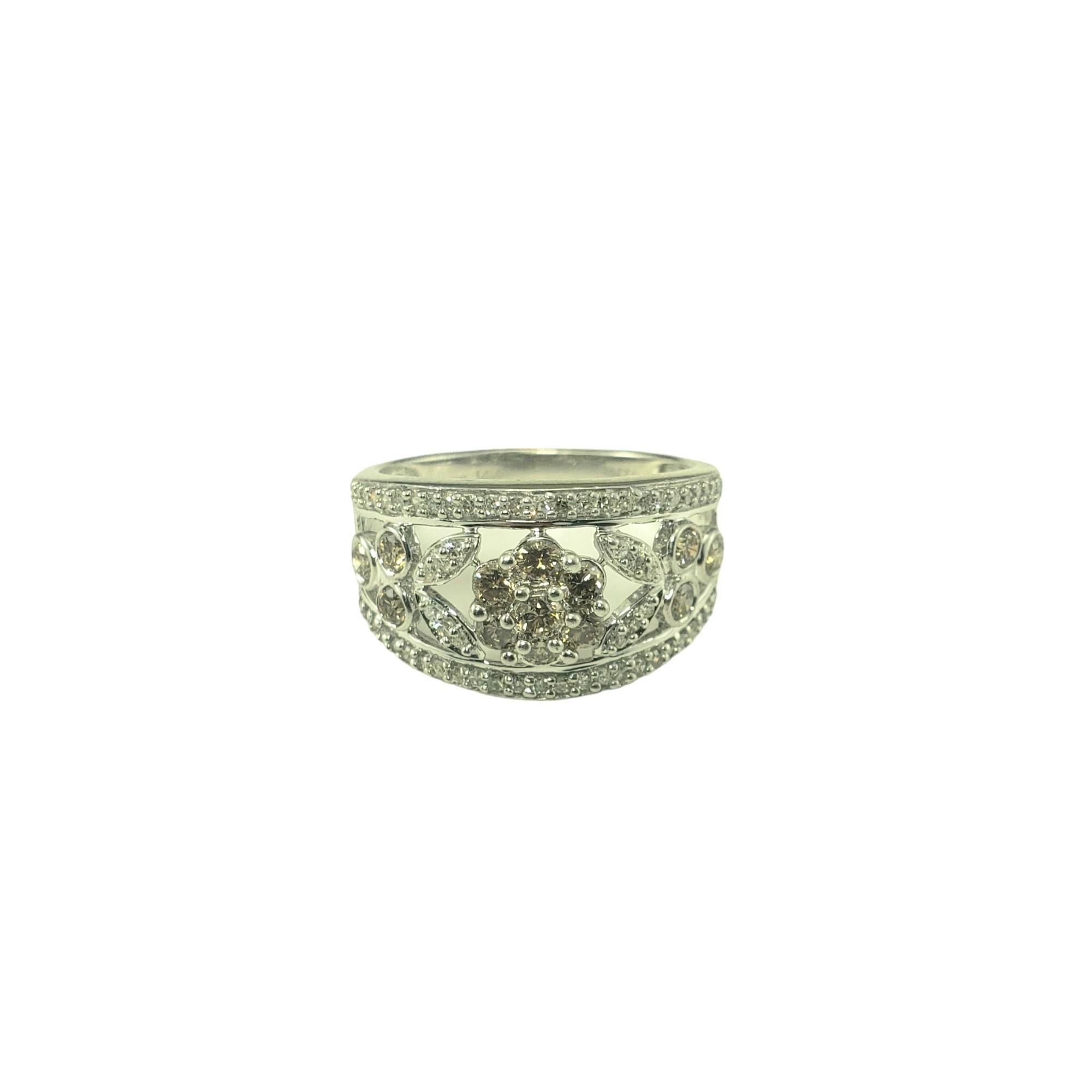 14 Karat White Gold Floral Diamond Band Ring Size 7.5-

This sparkling band features 13 round champagne diamonds and 62 round single cut diamonds set in beautifully open detailed 14K white gold.  

Width: 13 mm.  Shank: 2.5 mm.

Approximate total
