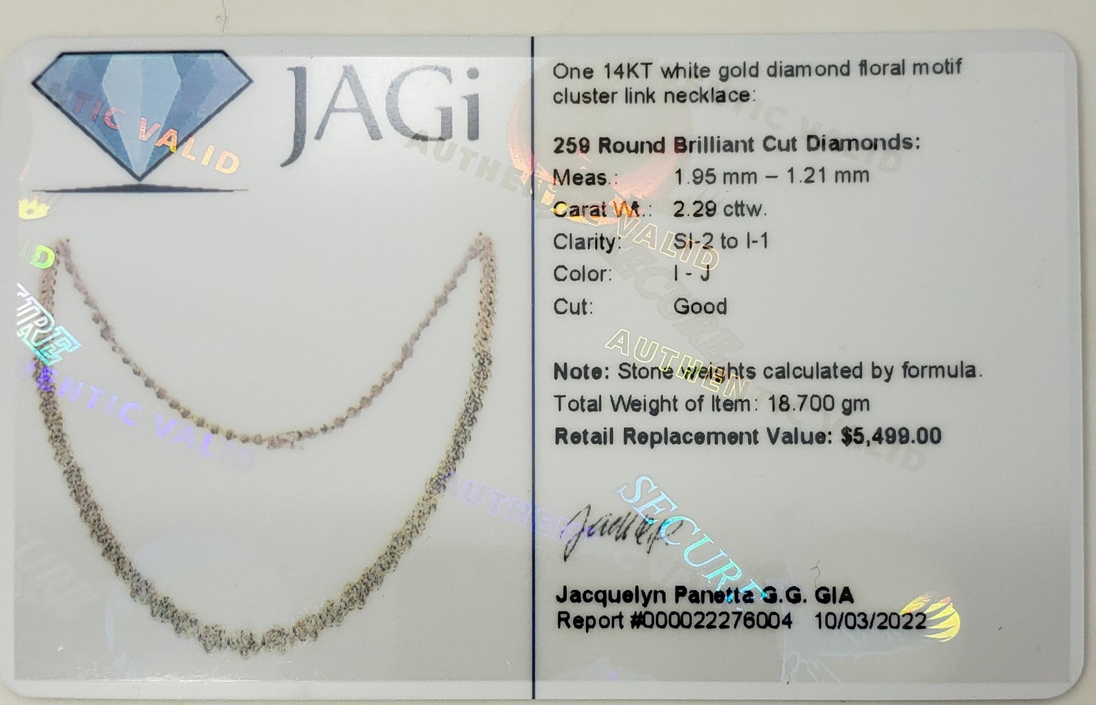 Vintage 14 Karat White Gold Diamond Flower Necklace JAGi Certified-

This sparkling necklace features 259 round brilliant cut diamonds set in beautifully detailed 14K white gold. Width: 6 mm.

Approximate total diamond weight: 2.29 ct.

Diamond