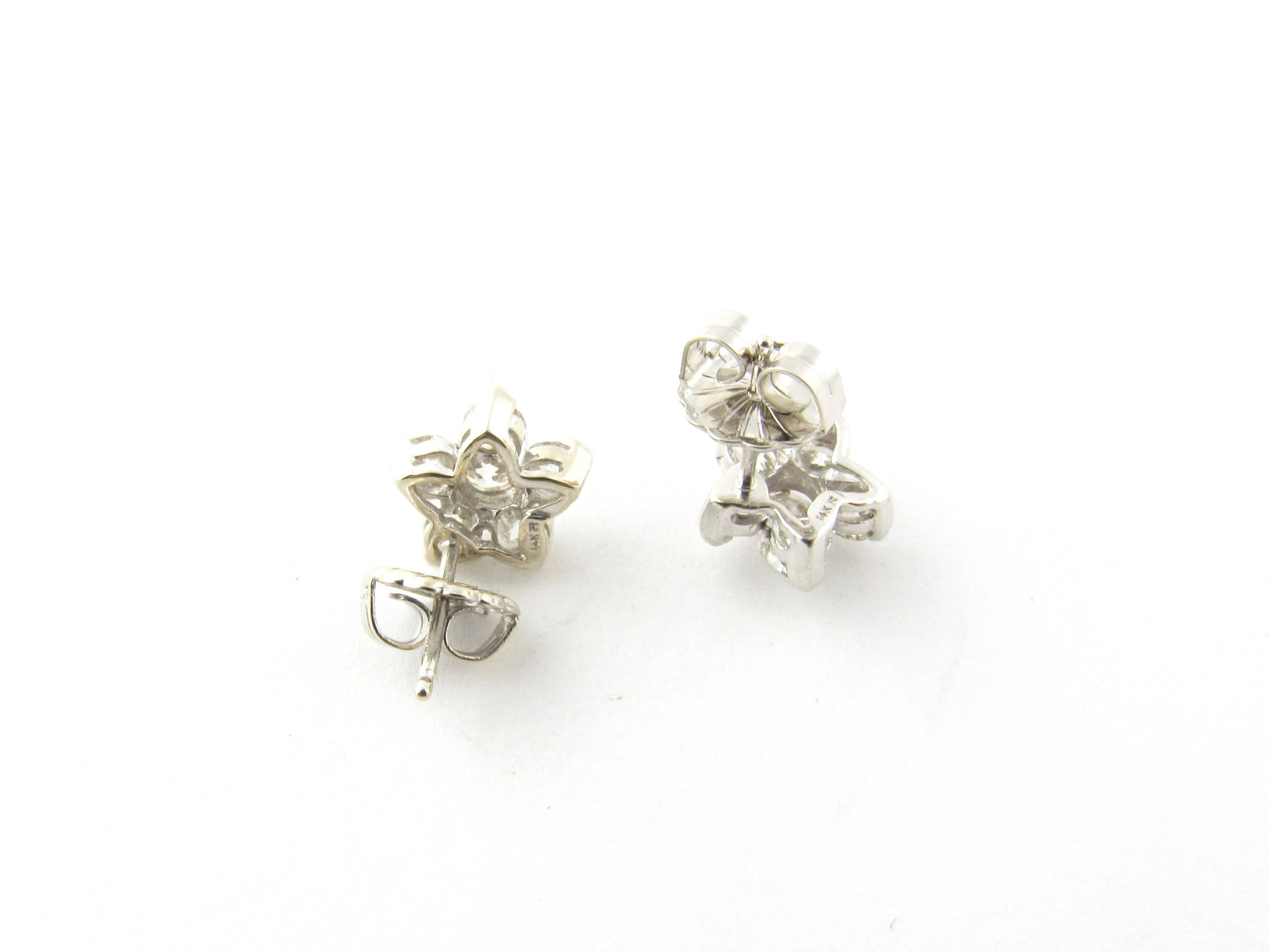 Round Cut 14 Karat White Gold Diamond Flower Earrings