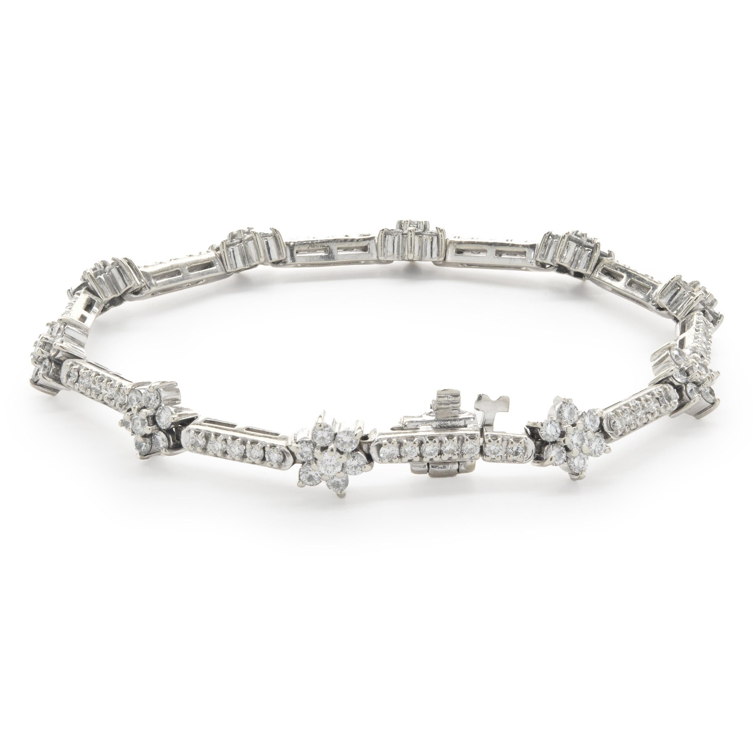 Designer: custom
Material: 14K white gold
Diamonds: 122 round brilliant cut = 2.30cttw
Color: H
Clarity: SI1
Dimensions: bracelet will fit up to a 6.25-inch wrist
Weight: 10.72 grams