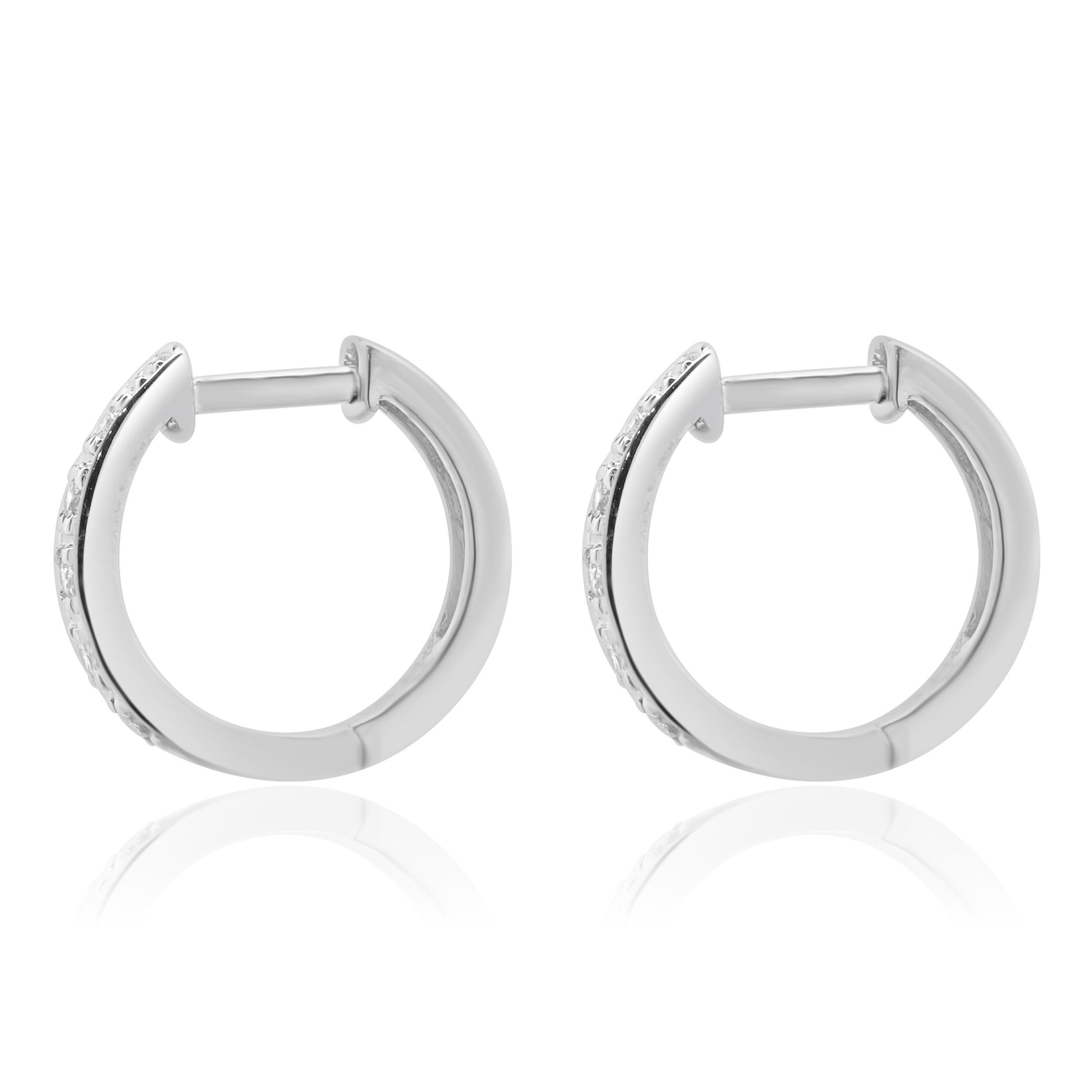 Material: 14K white gold
Diamonds: 10 round cut = 0.06cttw
Color: I
Clarity: SI2
Fastenings: Hinged
Dimensions: earrings measure approximately 11.84mm x 2.16mm
Weight: 1.62 grams
