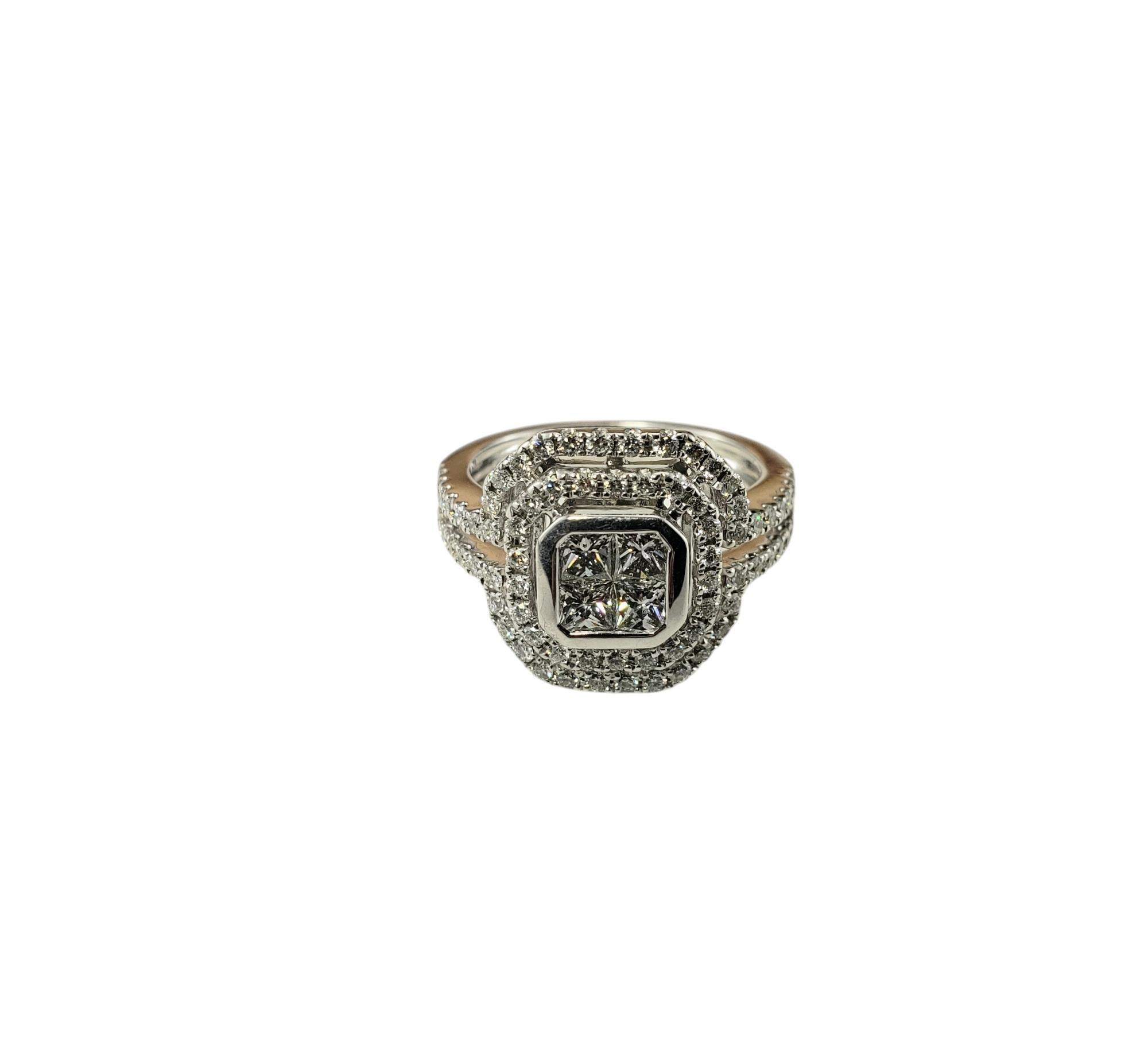 14 Karat White Gold Diamond Halo Cluster Ring Size 7.25

This dazzling ring features four princess cut diamonds and 74 round brilliant cut diamonds set in elegant 14K white gold.

Width: 15 mm. Shank: 3 mm.

Approximate total diamond weight: 1.00 -