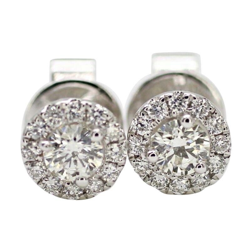 14 Karat White Gold Diamond Halo Earrings .63PTS.