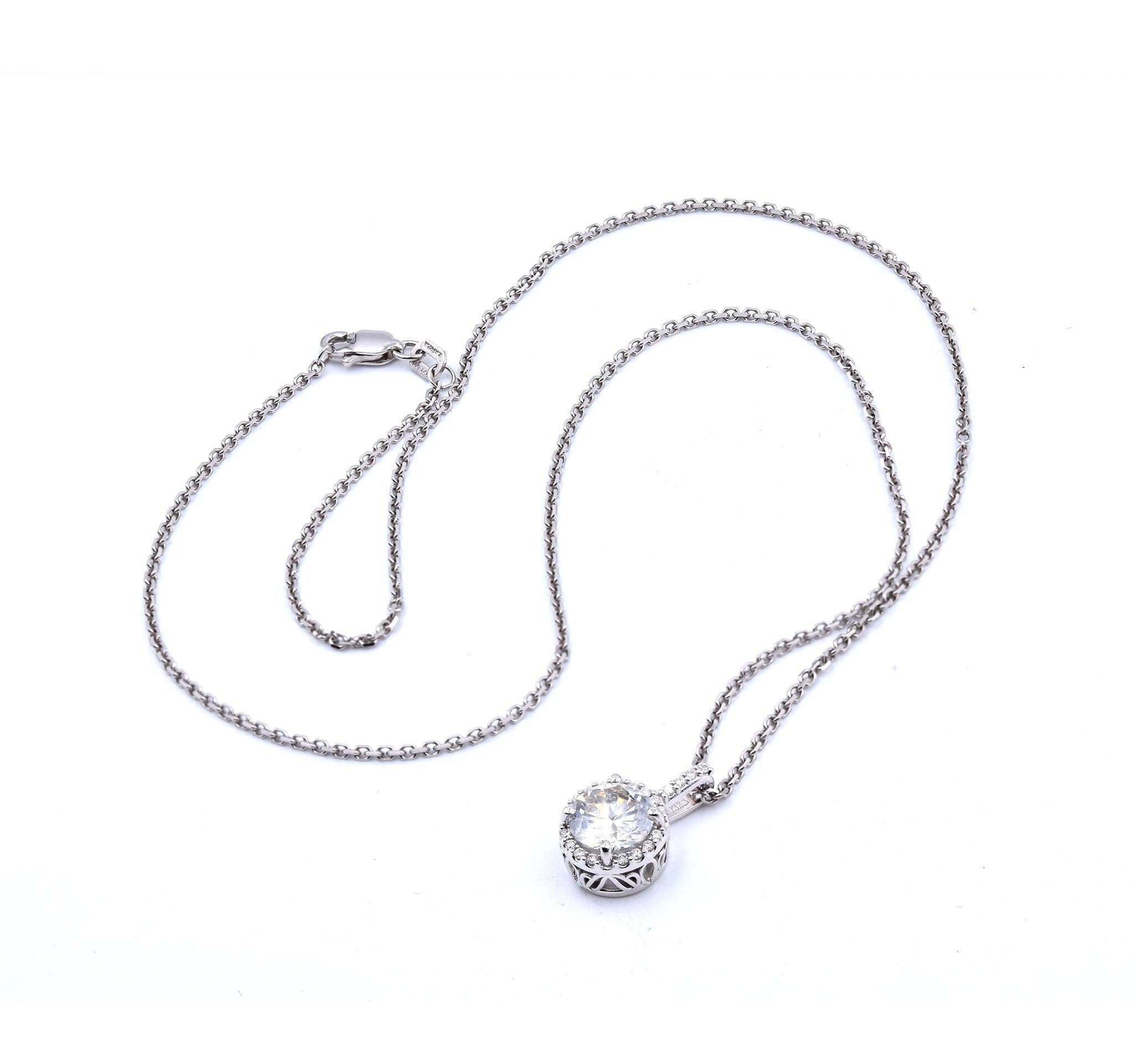 Designer: Custom
Material: 14K white gold
Center Diamond: 1 round brilliant cut = 1.42ct
Color: L/M
Clarity: I1 – Clarity Enhanced
Diamonds: 20 round brilliant cut = .20cttw
Color: G
Clarity: VS
Dimensions: necklace measures 18-inches
Weight: 4.60