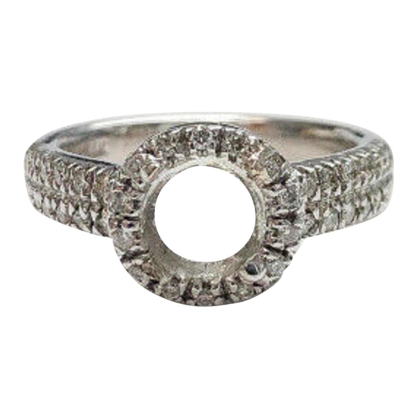 14 Karat White Gold Diamond Halo Ring