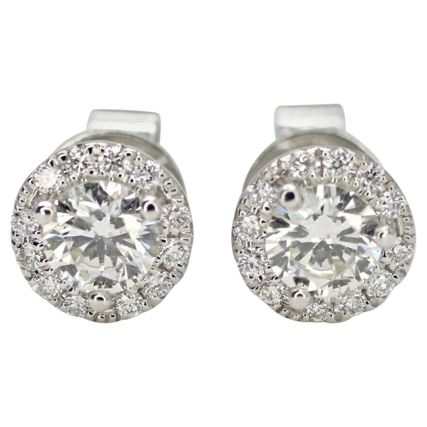 14 Karat White Gold Diamond Halo Stud Earrings .63pts Total Weight