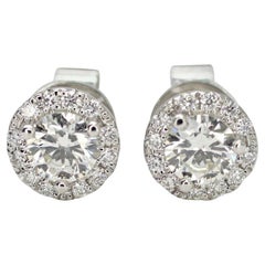 14 Karat White Gold Diamond Halo Stud Earrings .63pts Total Weight