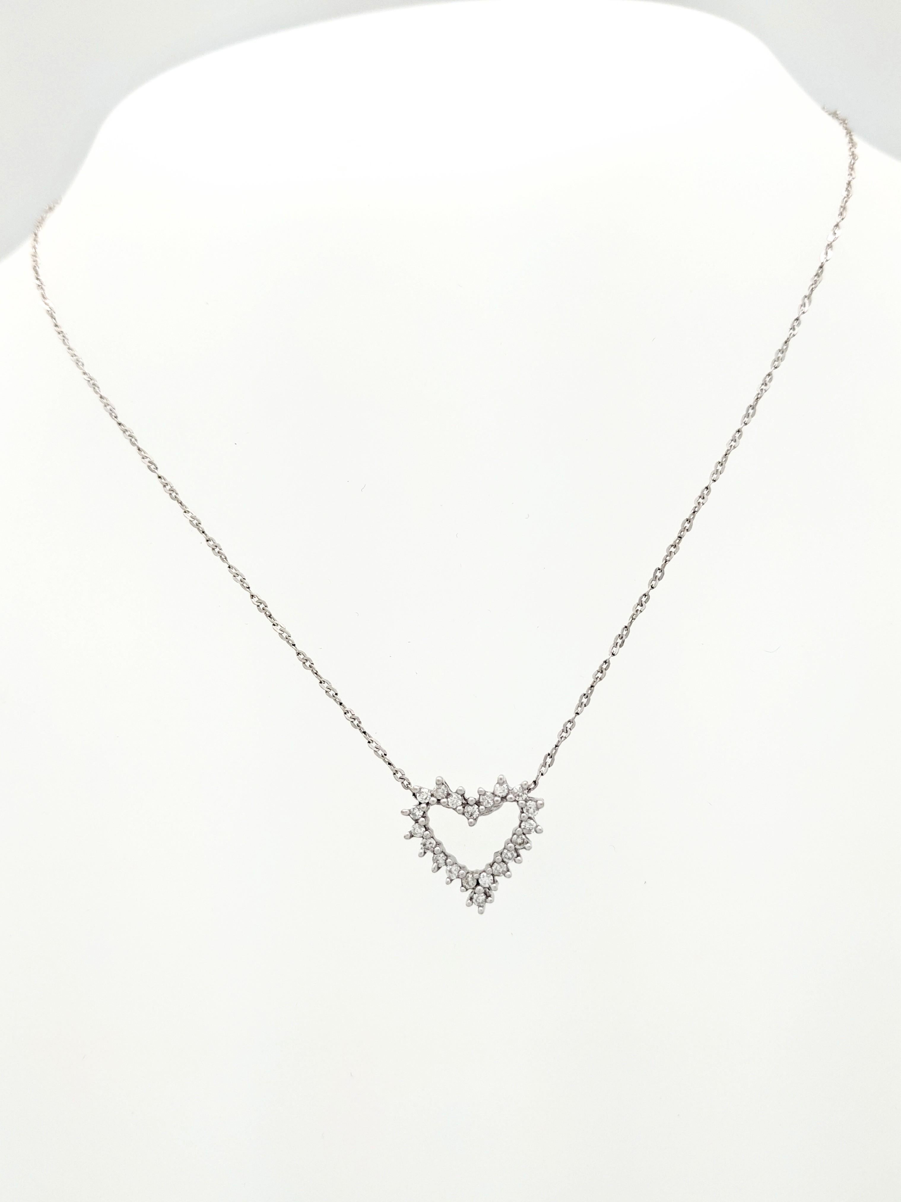 14K White Gold Diamond Heart Pendant Necklace

HJL:2018.000

You are viewing a beautiful diamond heart pendant necklace. The pendant is crafted from 14k white gold and features (20) .01ct round brilliant cut diamonds for an estimated .20tcw. The