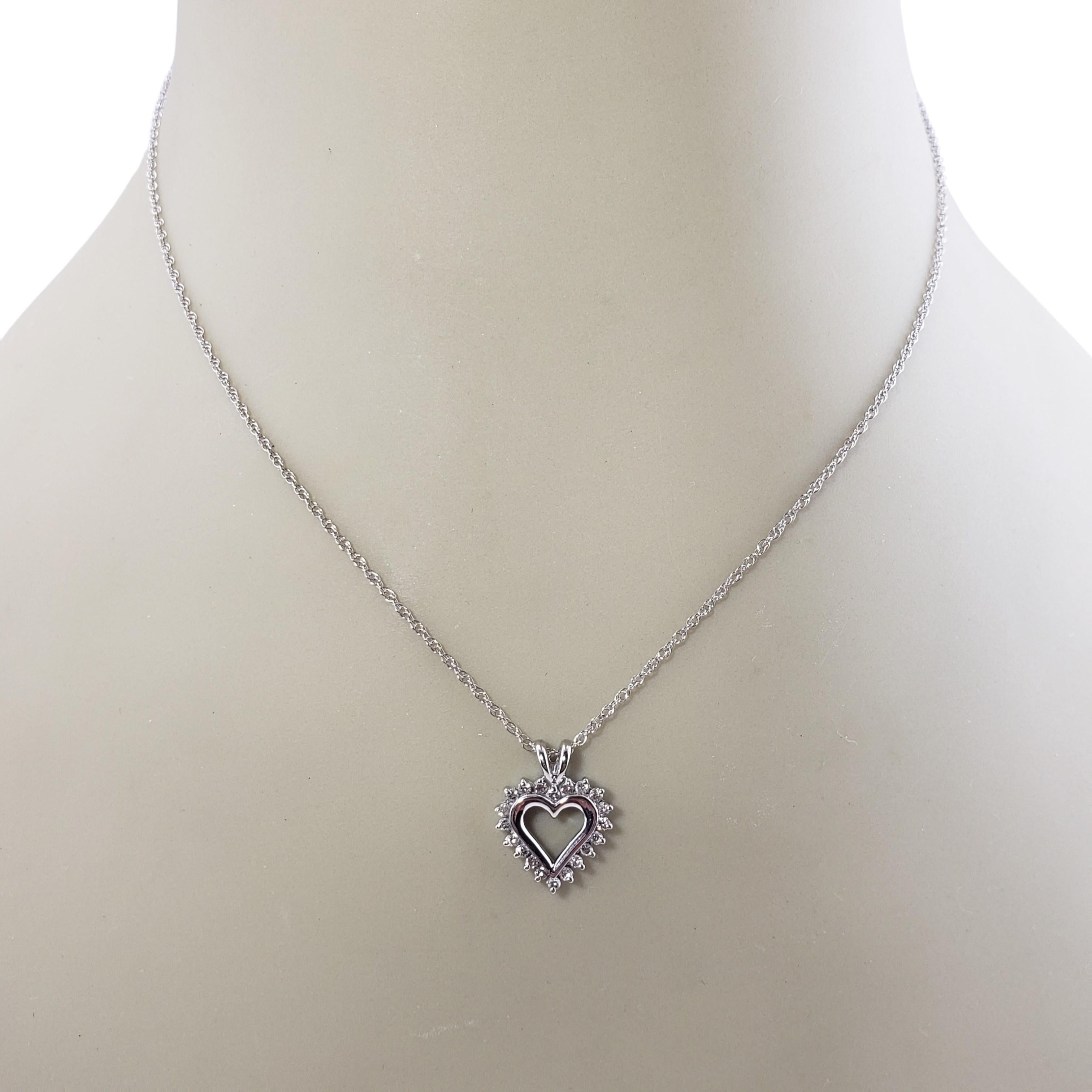 Round Cut 14 Karat White Gold Diamond Heart Pendant Necklace For Sale