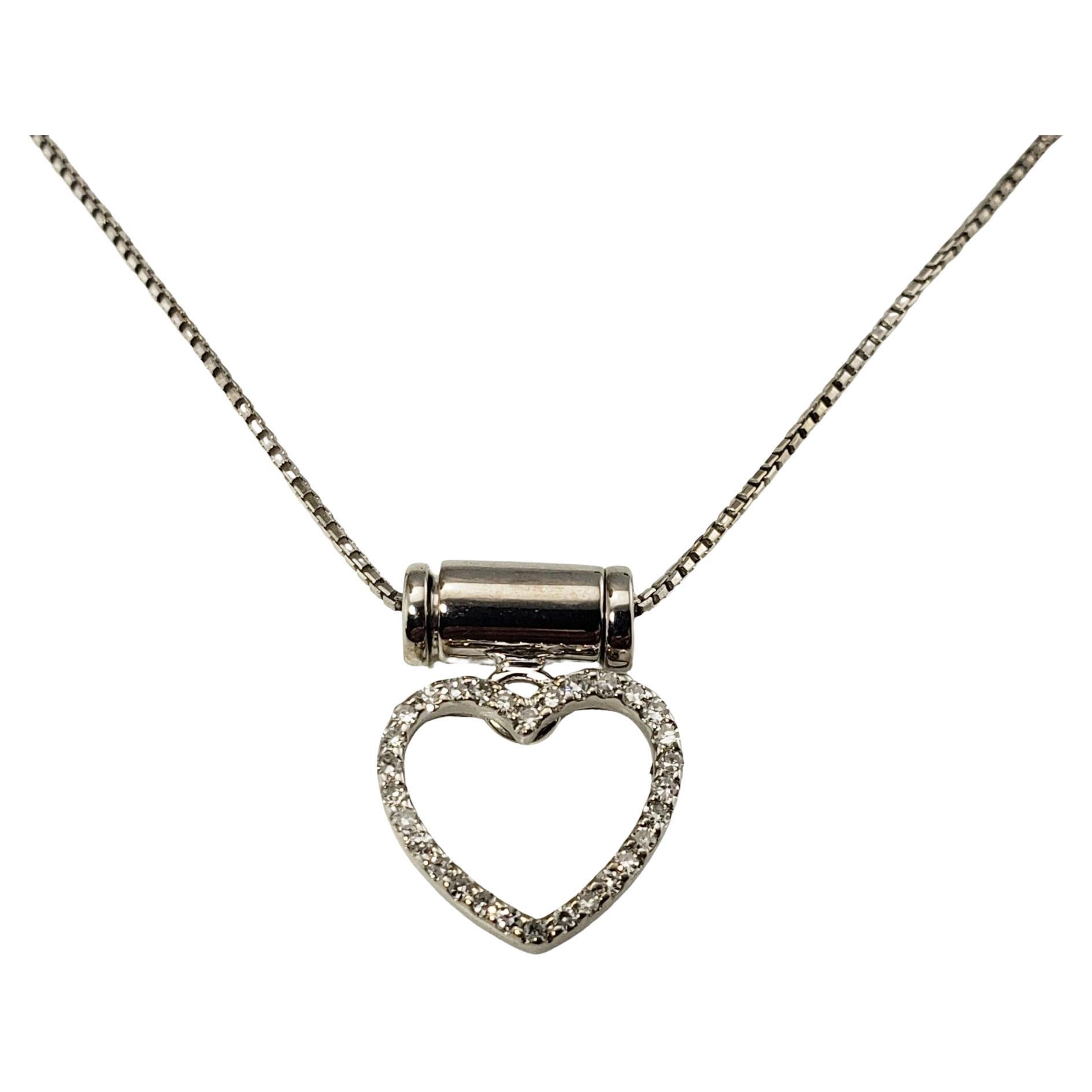 Collier pendentif en forme de cœur en or blanc 14 carats et diamants