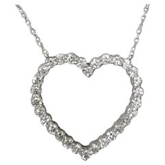14 Karat White Gold Diamond Heart Pendant with 6.57 Carat of Diamonds