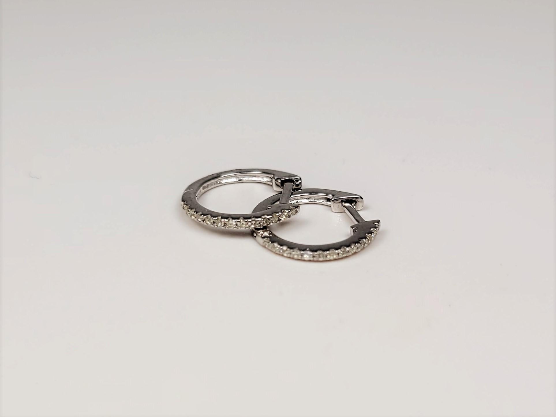 14 Karat White Gold Diamond Huggie Earrings In New Condition For Sale In Dallas, TX