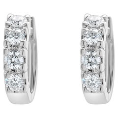 Boucles d'oreilles Huggie en or blanc 18 carats avec diamants