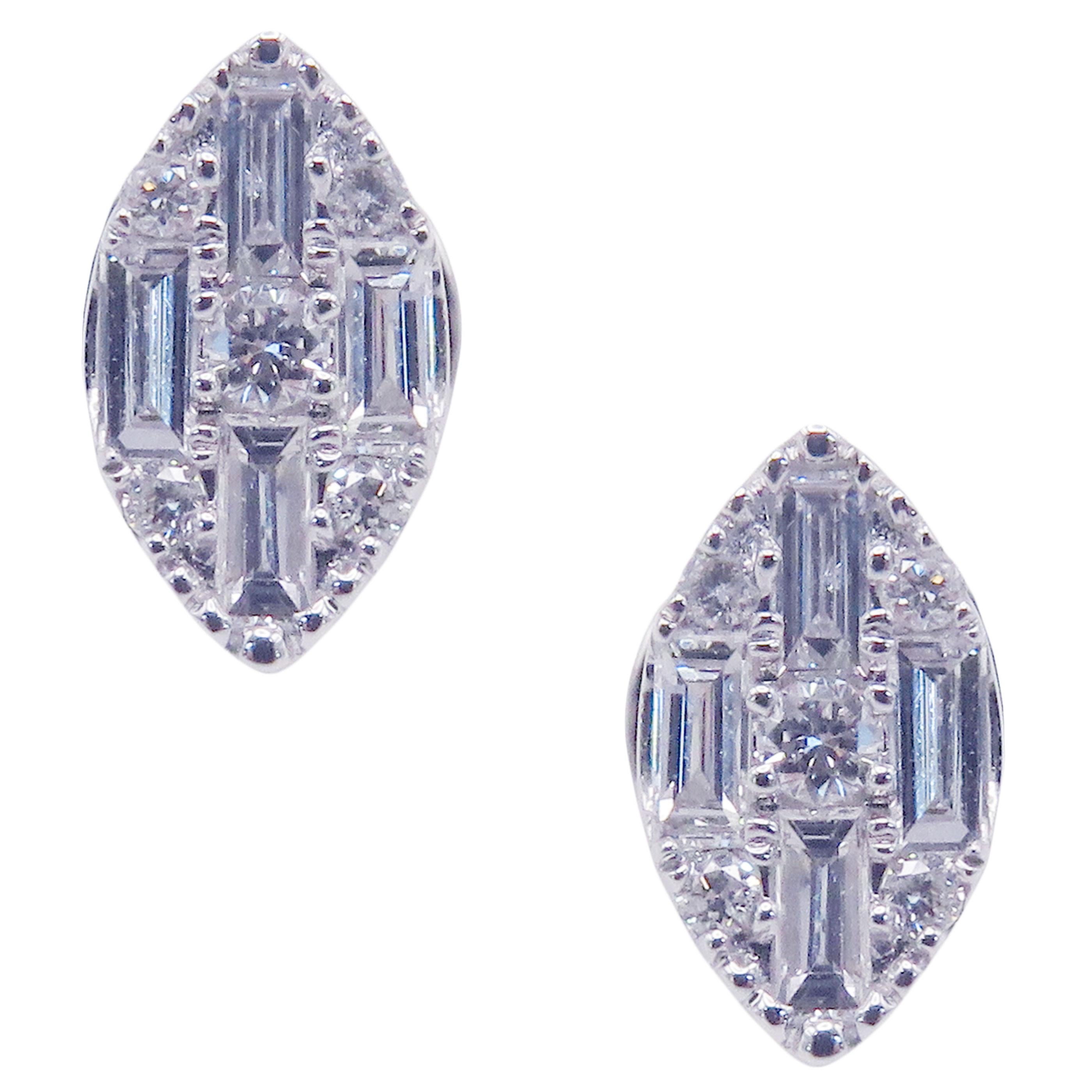 This round and baguette combination diamond illusion marquise-shape stud earring is crafted in 14-karat white gold, featuring 10 round white diamonds totaling of 0.08 carats and 8 baguette white diamonds totaling of 0.24 carats.
Approximate total