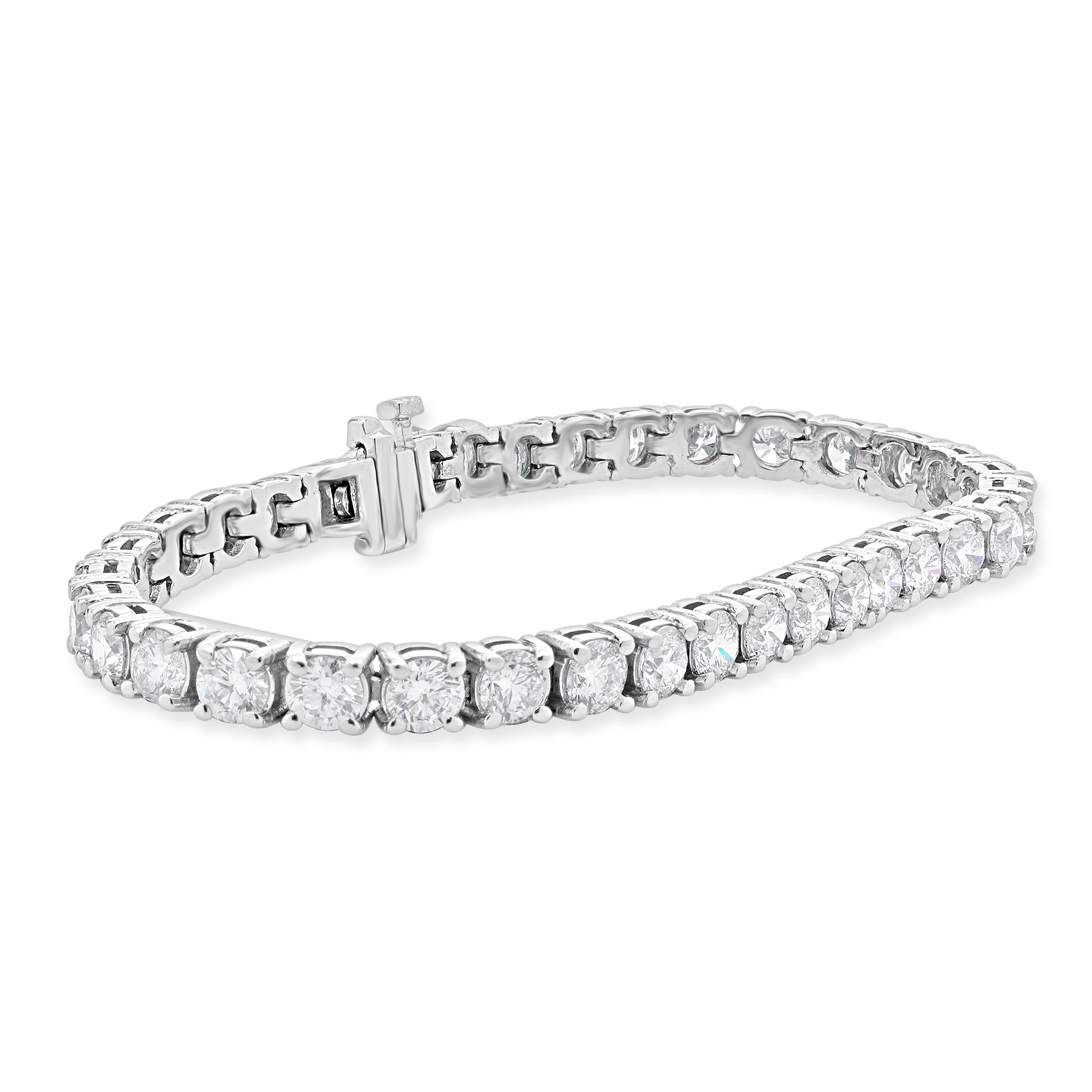 Designer : design personnalisé
Matériau : Or blanc 14K
Diamant : taille ronde brillant = 11,92cttw
Couleur : G / H
Clarté : VS2-SI1
Dimensions : le bracelet convient à un poignet de 7.5 pouces maximum.
Poids : 19,29 grammes

