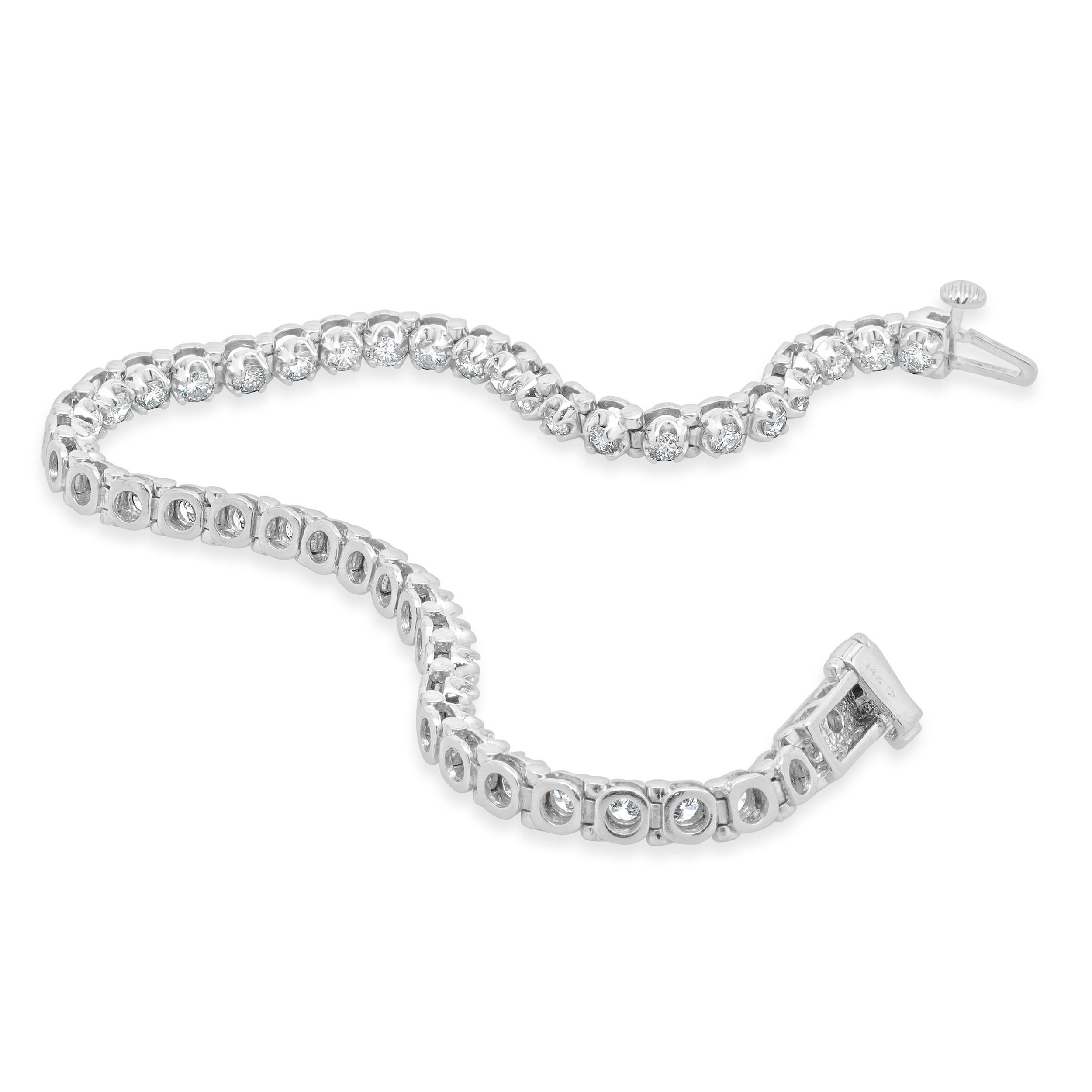 Round Cut 14 Karat White Gold Diamond Inline Tennis Bracelet For Sale